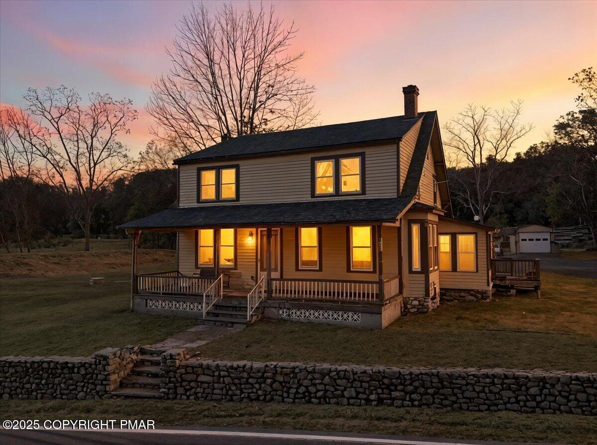 221 Upper Swiftwater Road Mount Pocono, PA 18344 - Photo 2 of 86 a front view of a house with a yard