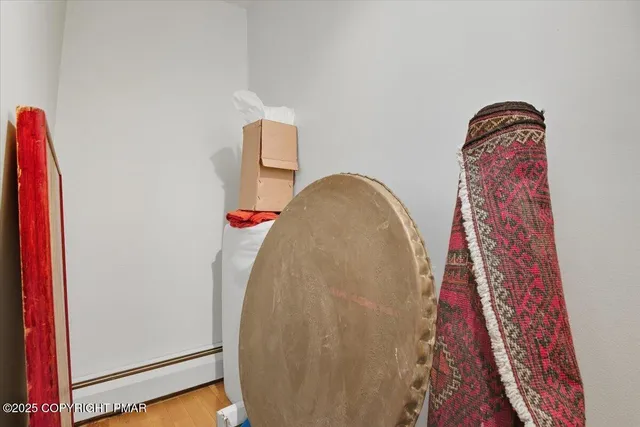 a kitchen with stainless steel appliances kitchen island granite countertop a refrigerator stove and sink