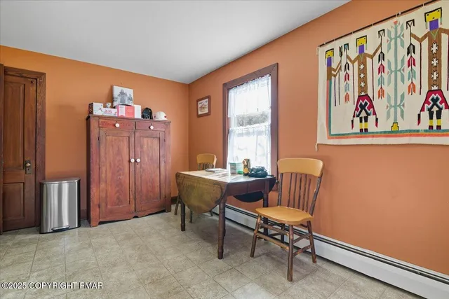 a view of a house with a yard and deck