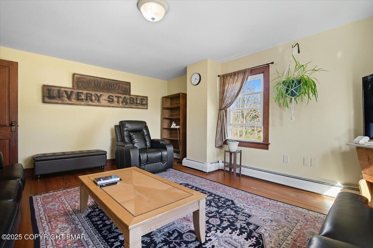 221 Upper Swiftwater Road Mount Pocono, PA 18344 - Photo 49 of 86 a picture of a couch in a room