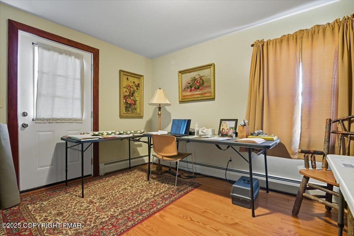 221 Upper Swiftwater Road Mount Pocono, PA 18344 - Photo 56 of 86 a living room with furniture and a window