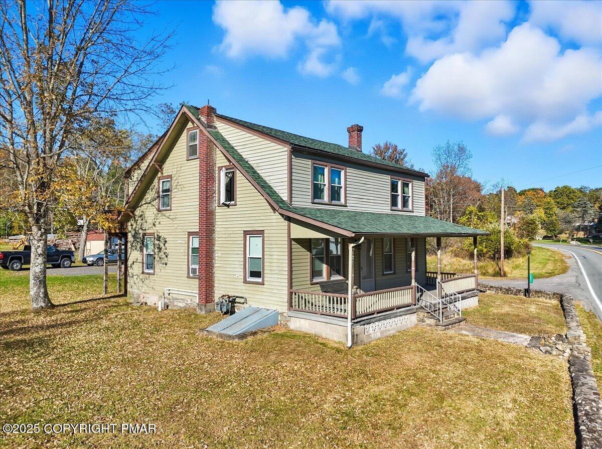 221 Upper Swiftwater Road Mount Pocono, PA 18344 - Photo 6 of 86 a view of a house with a yard