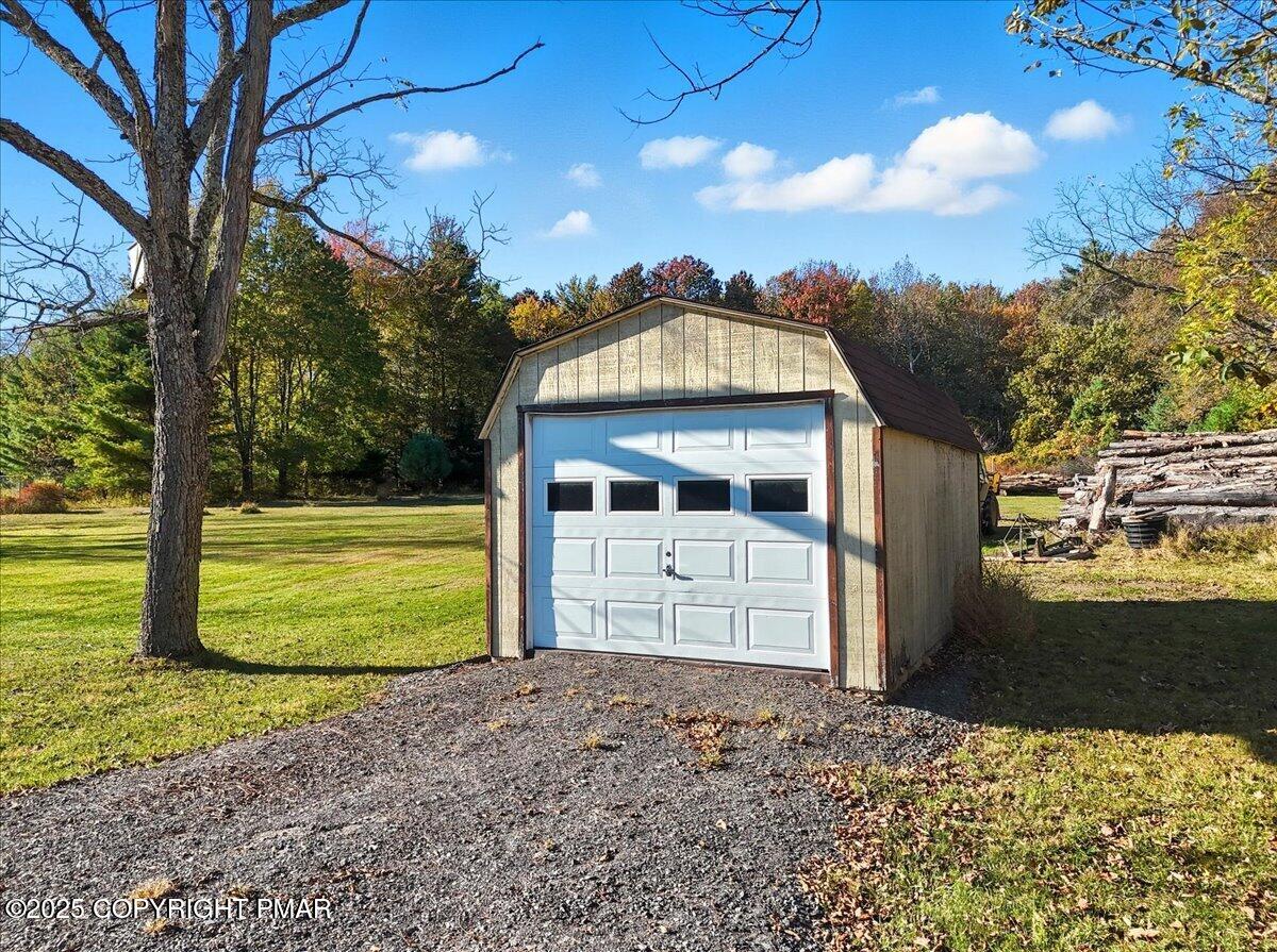 221 Upper Swiftwater Road Mount Pocono, PA 18344 - Photo 63 of 86 a front view of a house with a yard