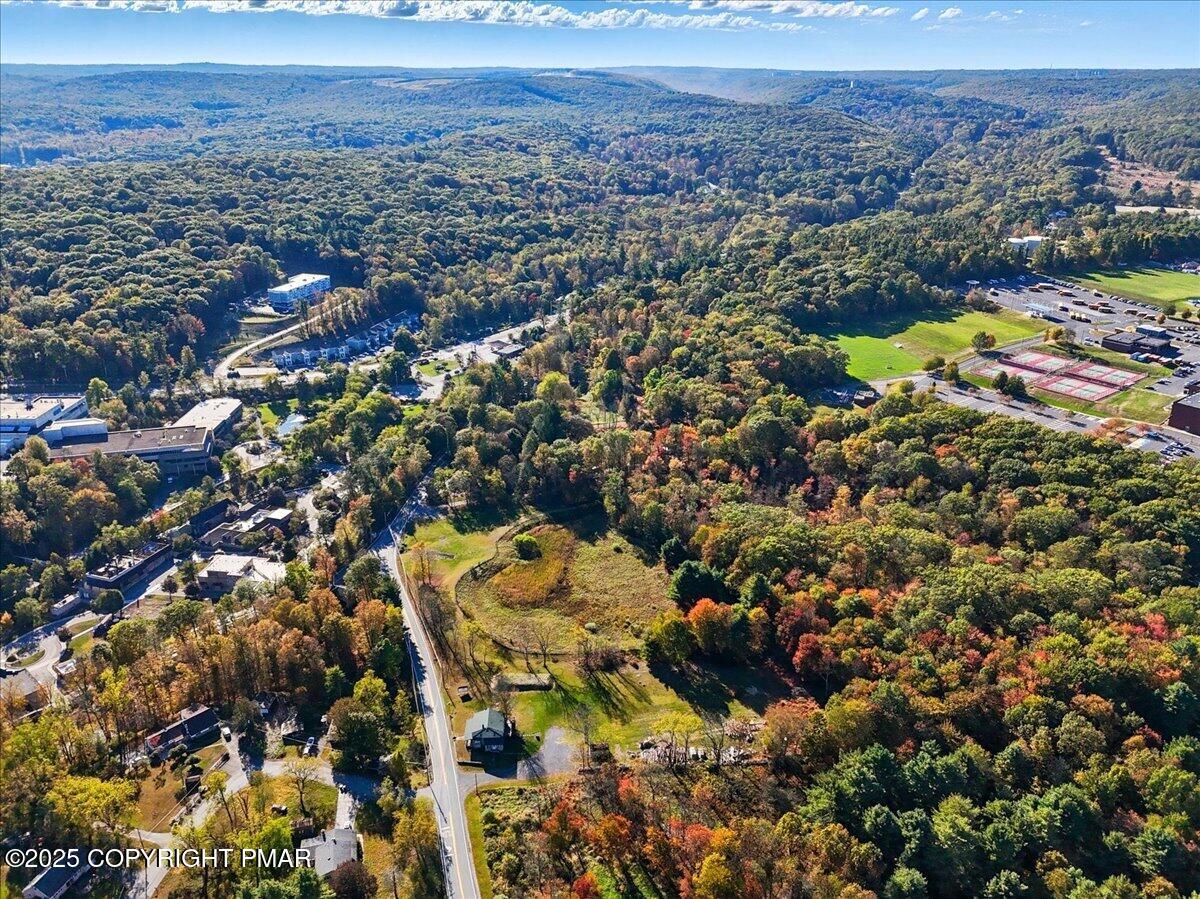 221 Upper Swiftwater Road Mount Pocono, PA 18344 - Photo 78 of 86 an aerial view of residential houses with outdoor space