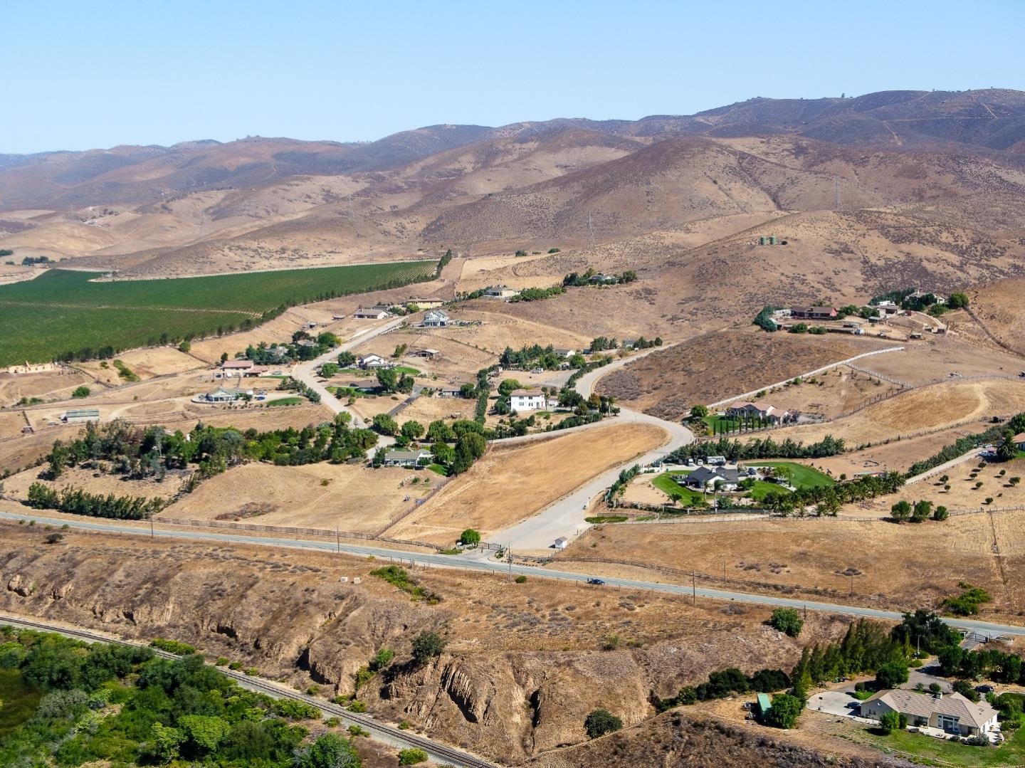 35700 Eagle Ridge Soledad, CA 93960 - Photo 3 of 7 an aerial view of mountain with residential houses covered by trees