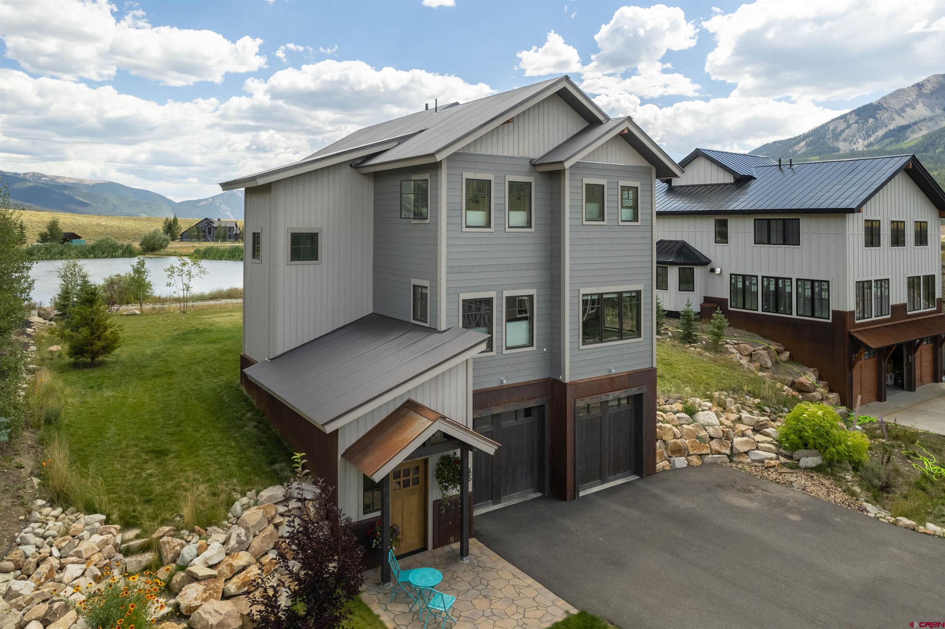 142 Larkspur Loop Crested Butte, CO 81224 - Photo 24 of 35 a aerial view of a house with a yard
