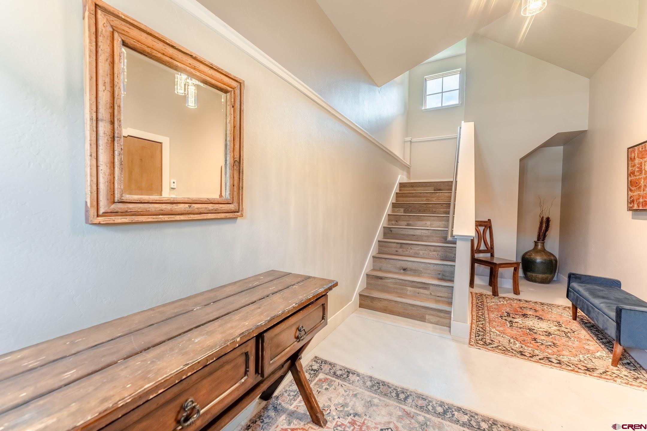 142 Larkspur Loop Crested Butte, CO 81224 - Photo 26 of 35 a view of a livingroom with wooden floor and stairs