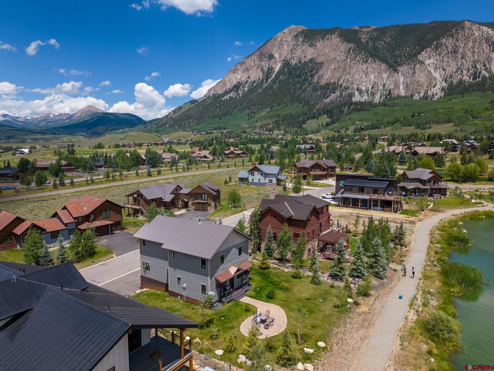 142 Larkspur Loop Crested Butte, CO 81224 - Photo 29 of 35 a view of a houses with a lake