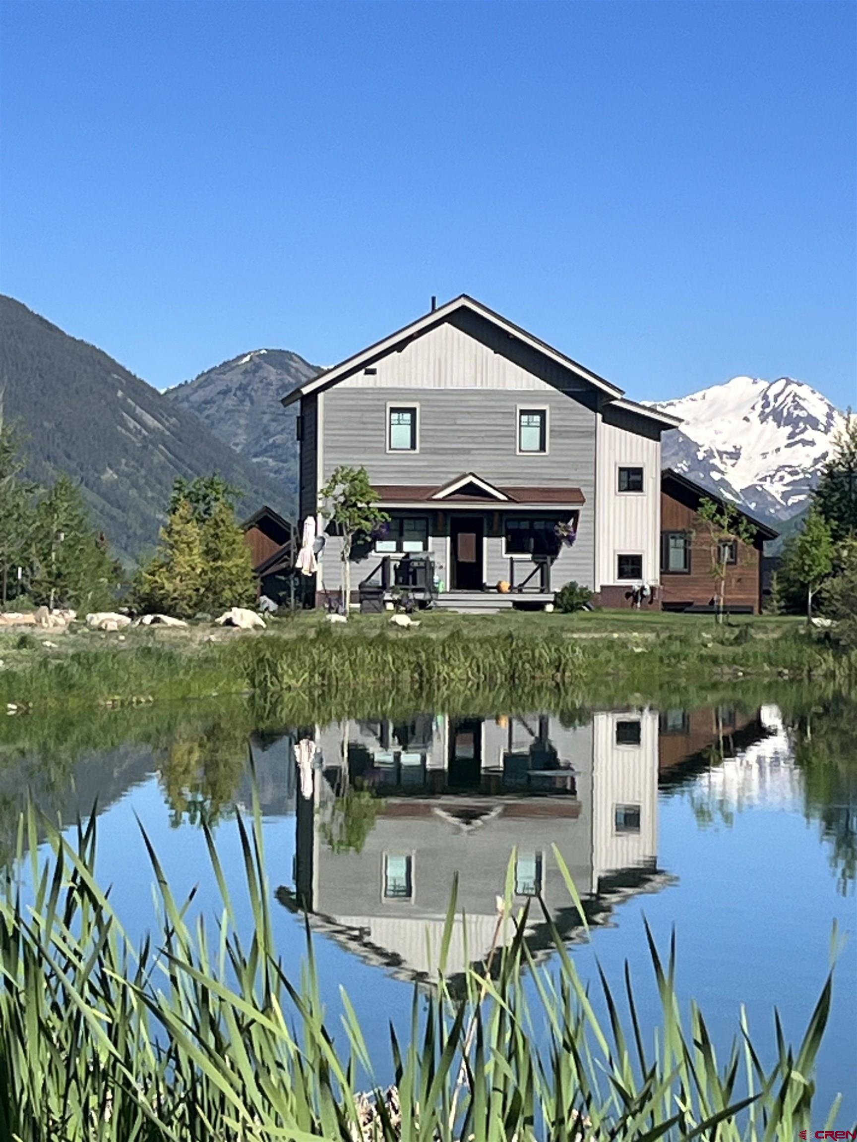 142 Larkspur Loop Crested Butte, CO 81224 - Photo 32 of 35 a view of a house with a yard