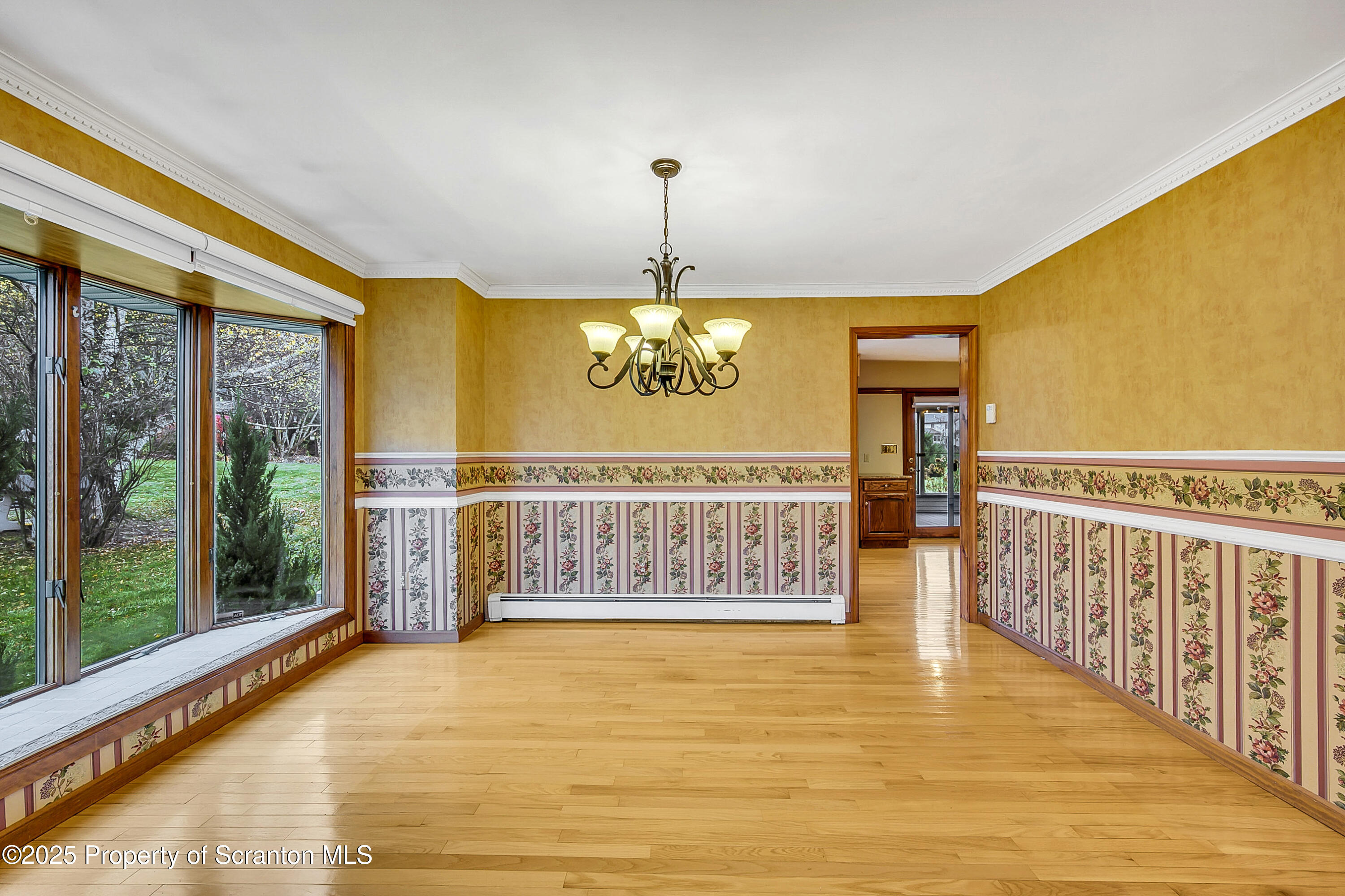 804 Fairview Road Clarks Summit, PA 18411 - Photo 17 of 49 a view of a room with furniture wooden floor and window