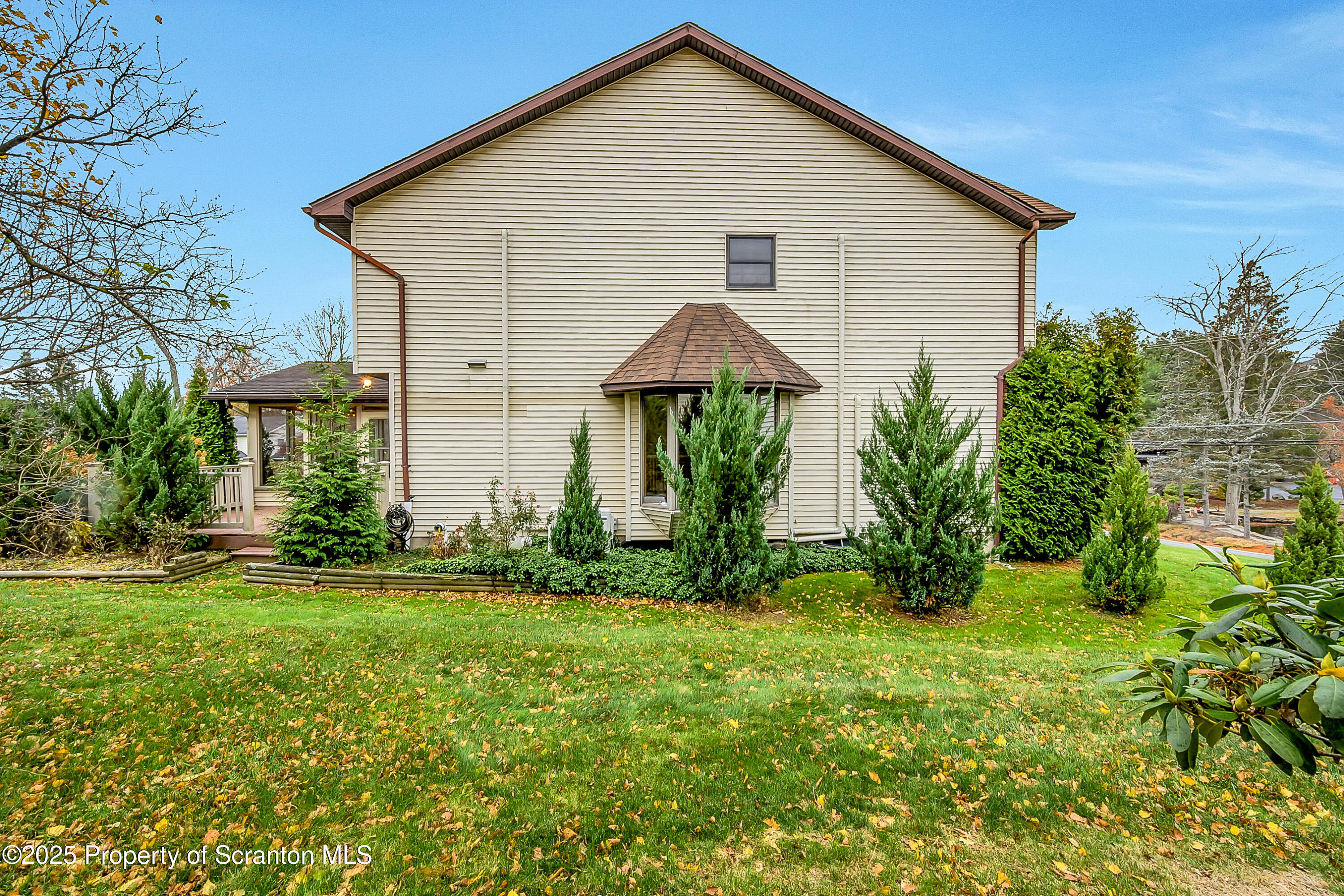 804 Fairview Road Clarks Summit, PA 18411 - Photo 4 of 49 a front view of house with yard and green space