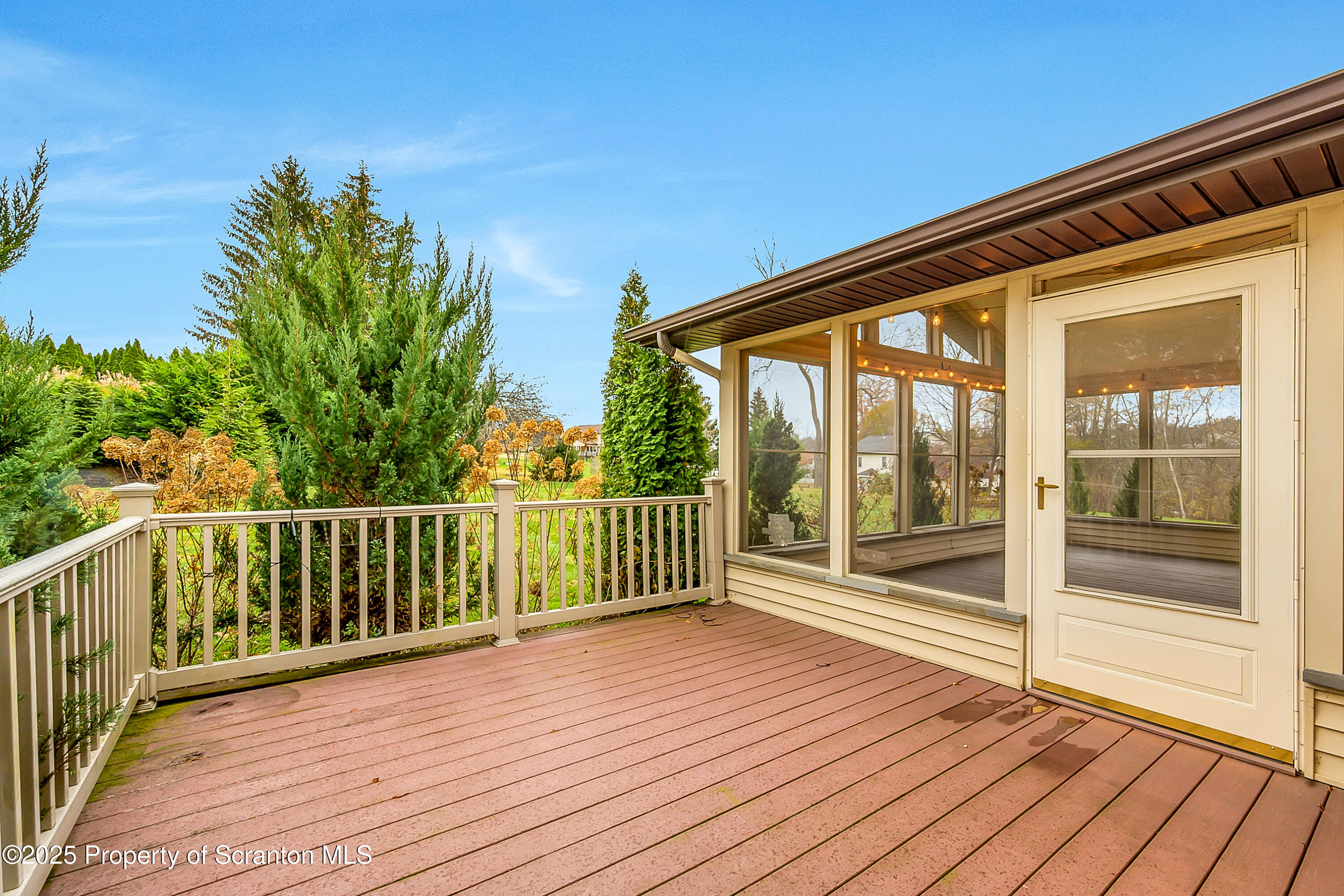 804 Fairview Road Clarks Summit, PA 18411 - Photo 8 of 49 a balcony view with wooden floor and fence