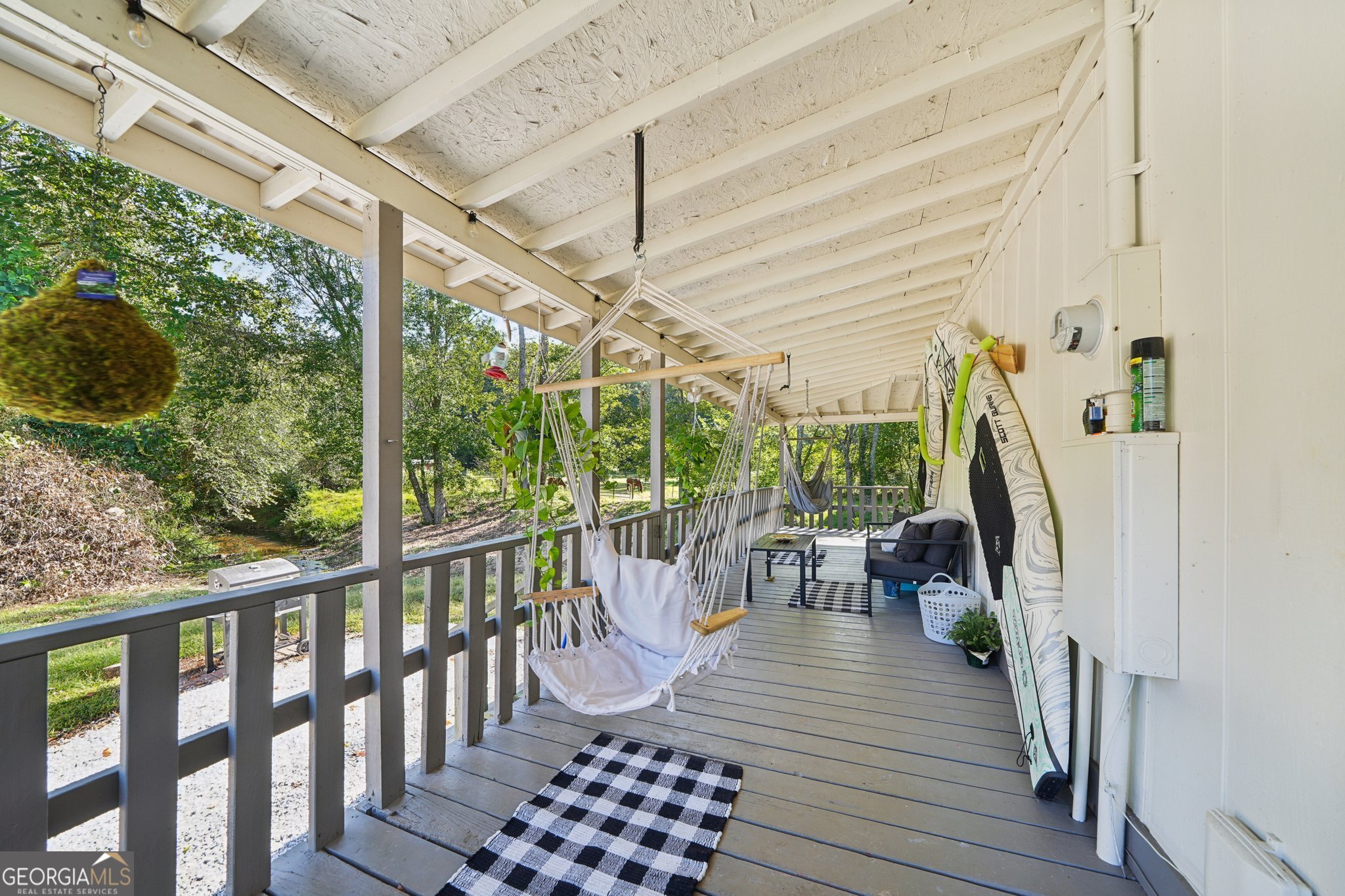 786 Moon Road Waco, GA 30182 - Photo 19 of 53 a view of a porch with wooden floor