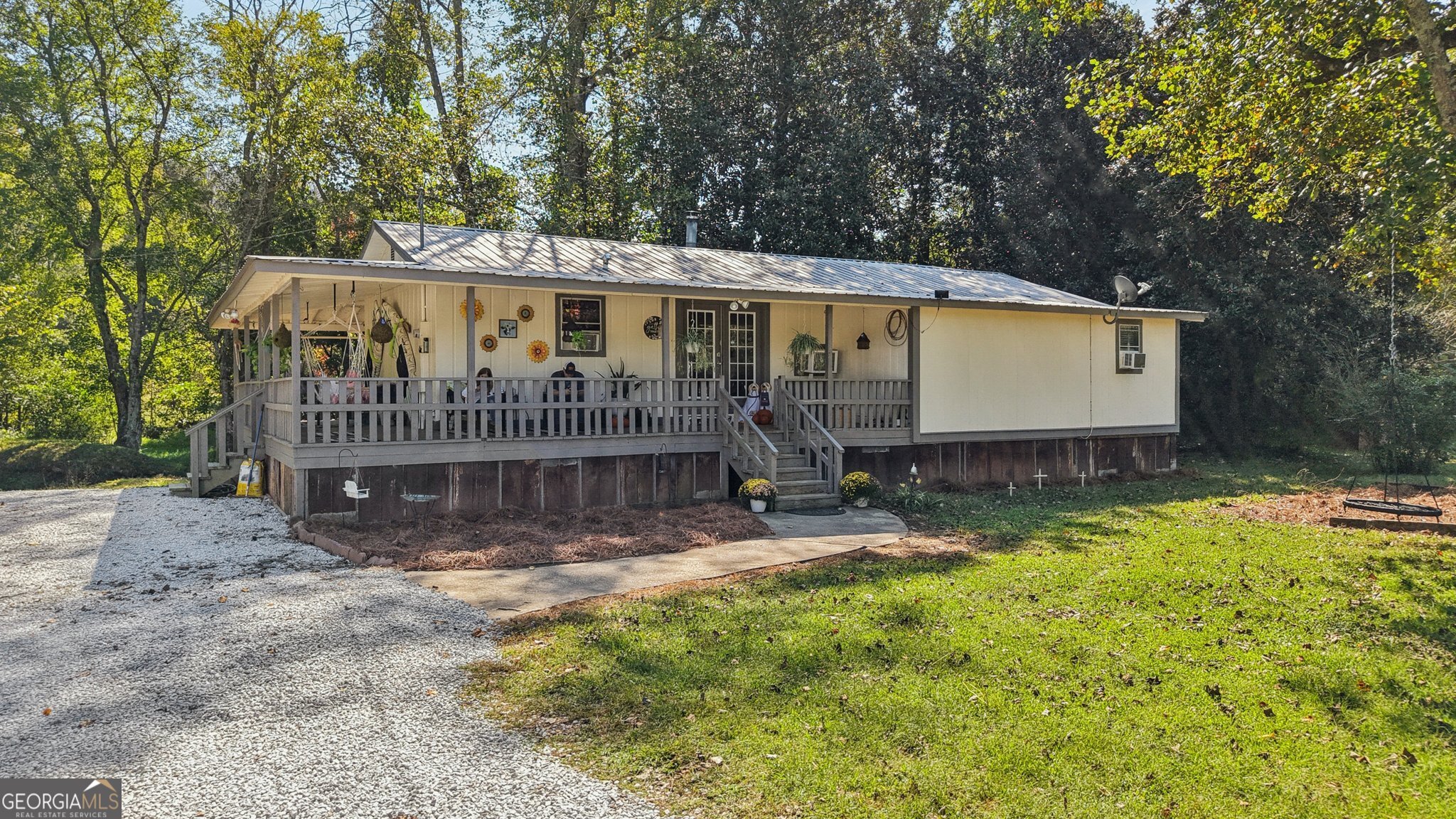 786 Moon Road Waco, GA 30182 - Photo 2 of 53 a view of a house with a yard and wooden fence