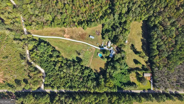 a view of a lake with a yard