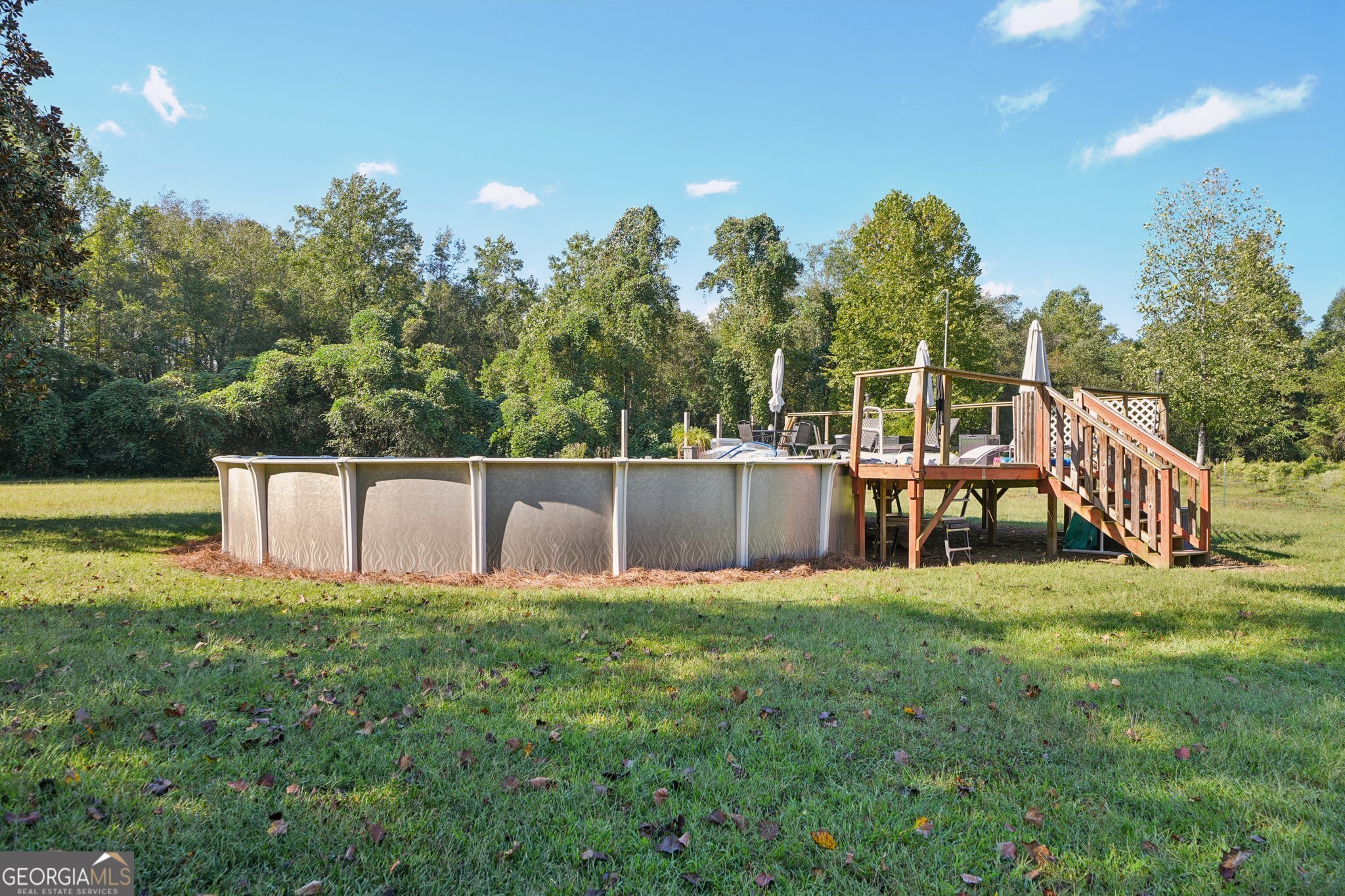 786 Moon Road Waco, GA 30182 - Photo 35 of 53 a view of a house with a yard and trees