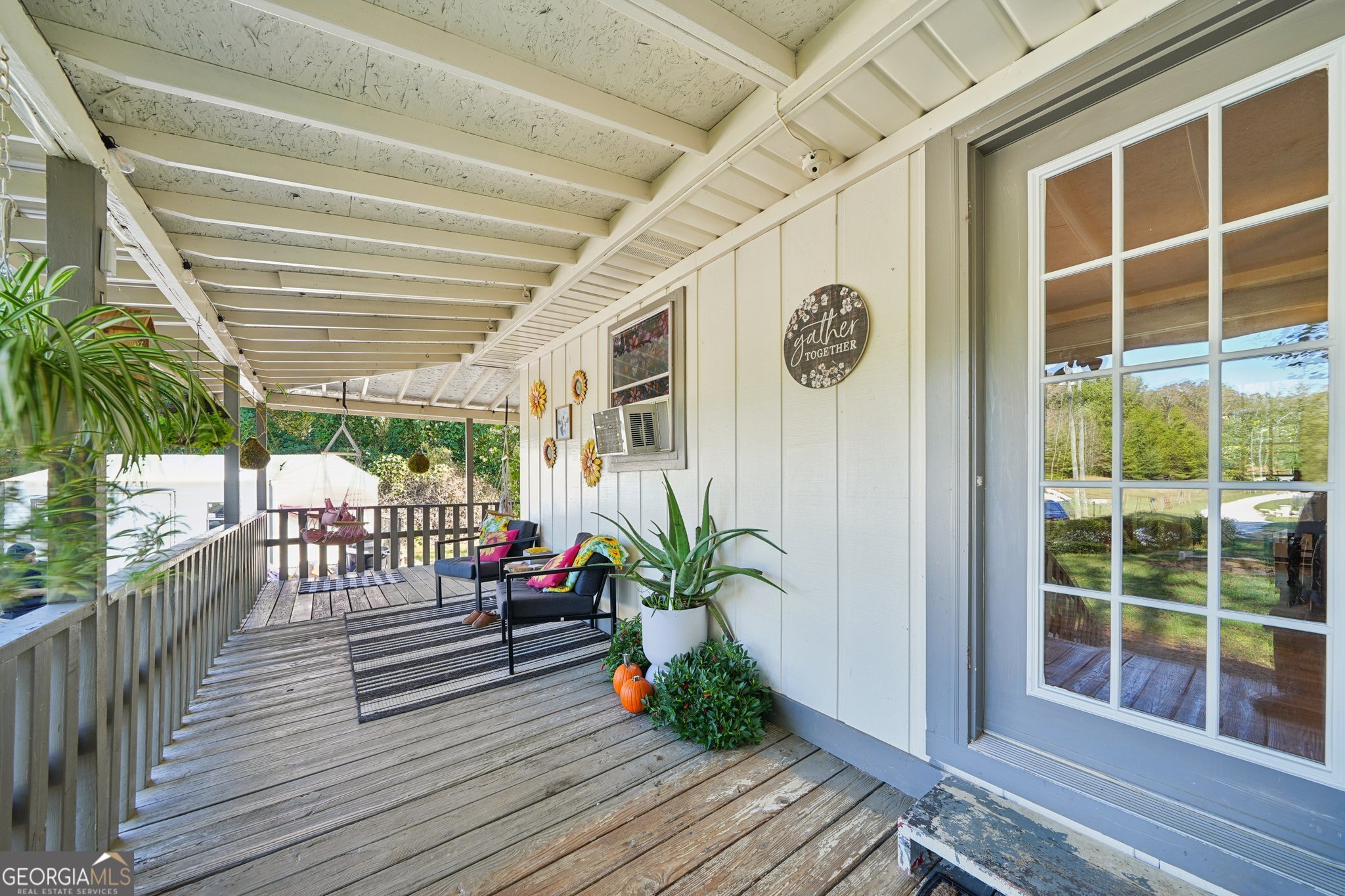786 Moon Road Waco, GA 30182 - Photo 4 of 53 a porch with wooden floor