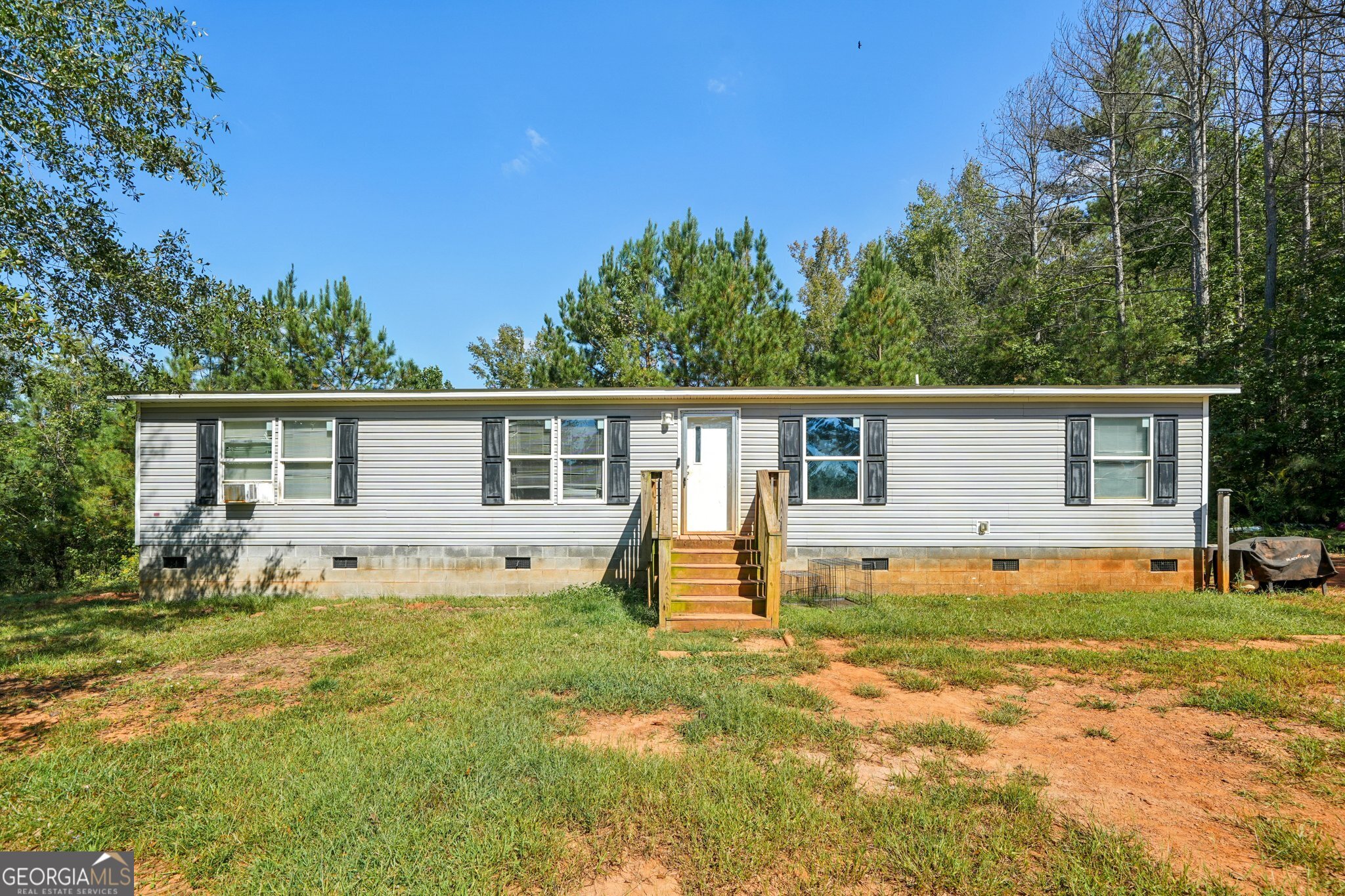 786 Moon Road Waco, GA 30182 - Photo 41 of 53 a front view of a house with yard