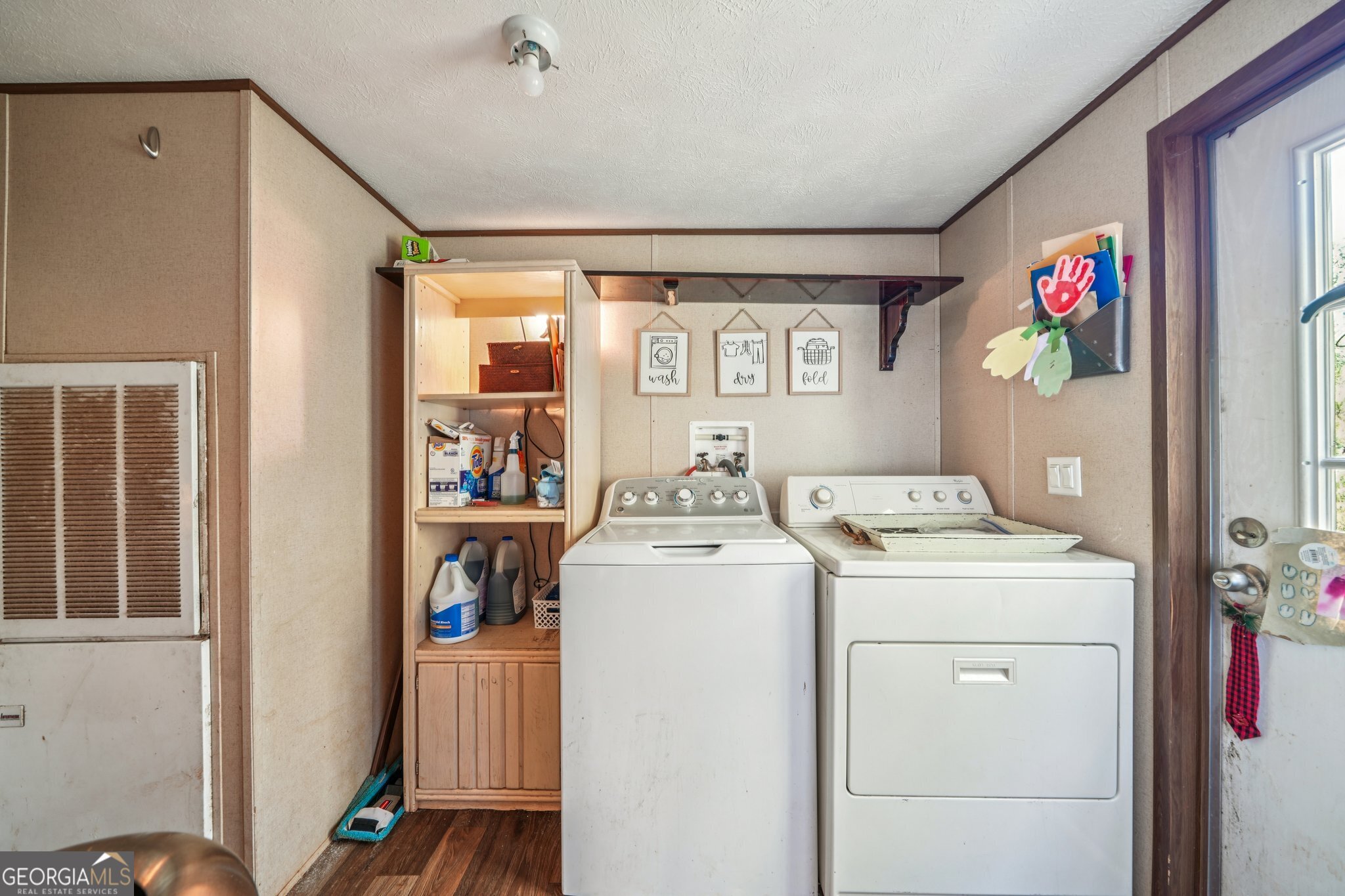 786 Moon Road Waco, GA 30182 - Photo 52 of 53 a utility room with dryer and washer