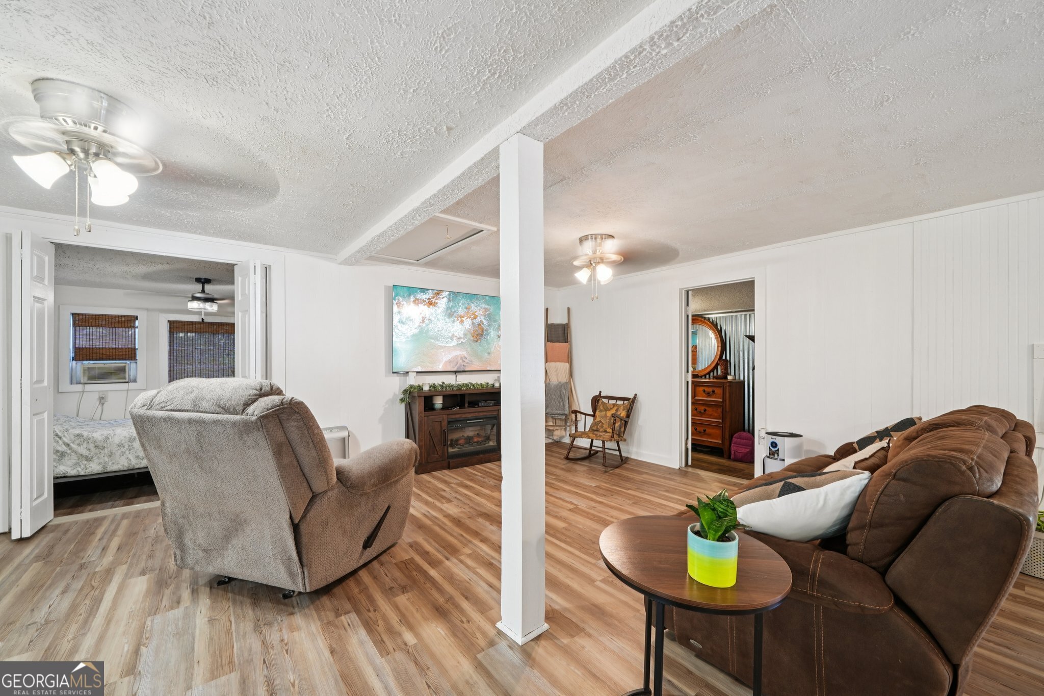 786 Moon Road Waco, GA 30182 - Photo 6 of 53 a living room with furniture and wooden floor