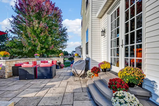 a outdoor space with tables and chairs