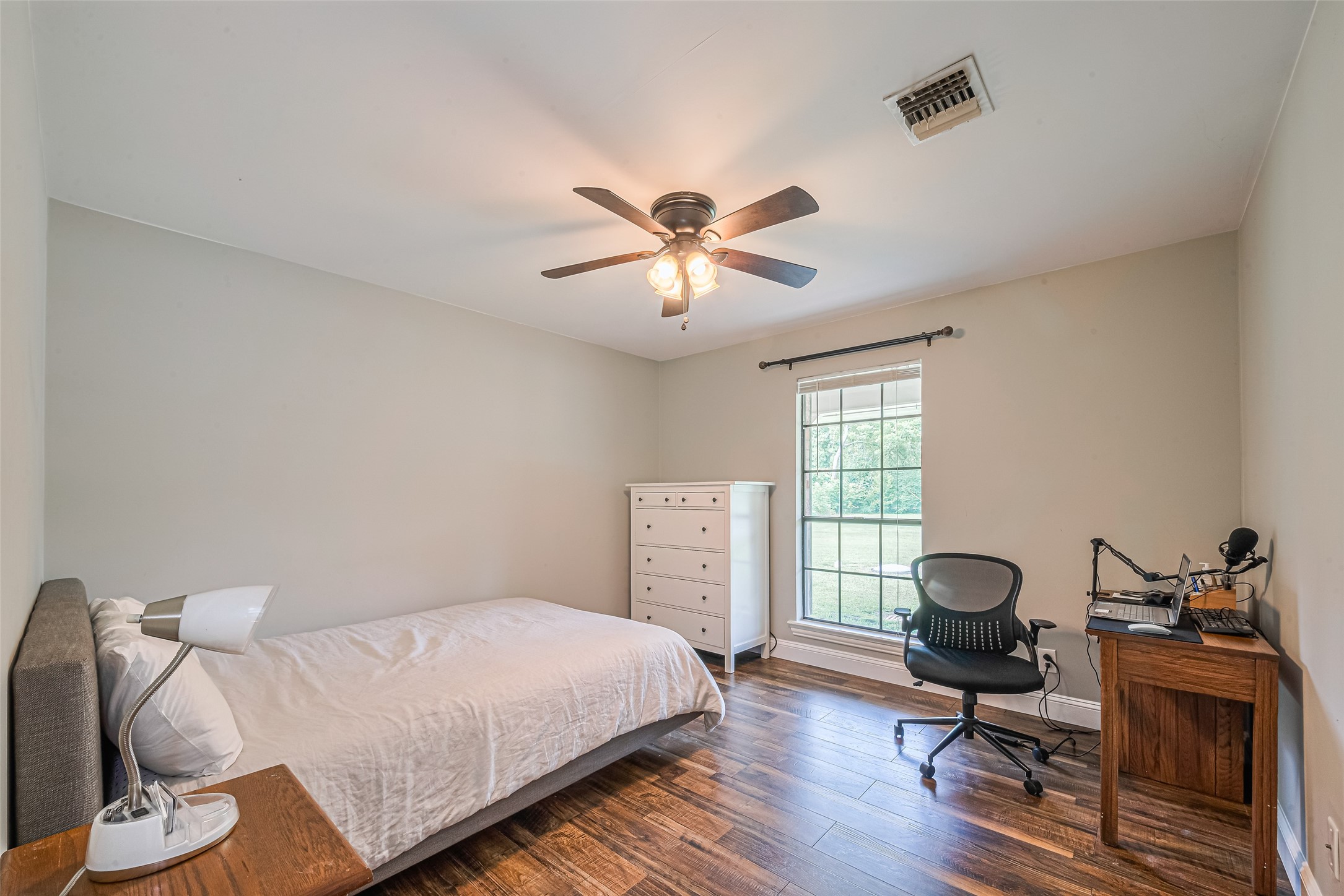 24314 Anderson Street Huffman, TX 77336 - Photo 33 of 48 a workspace with furniture and a window