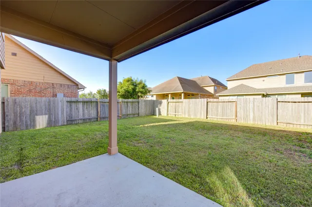 a view of a porch with a backyard