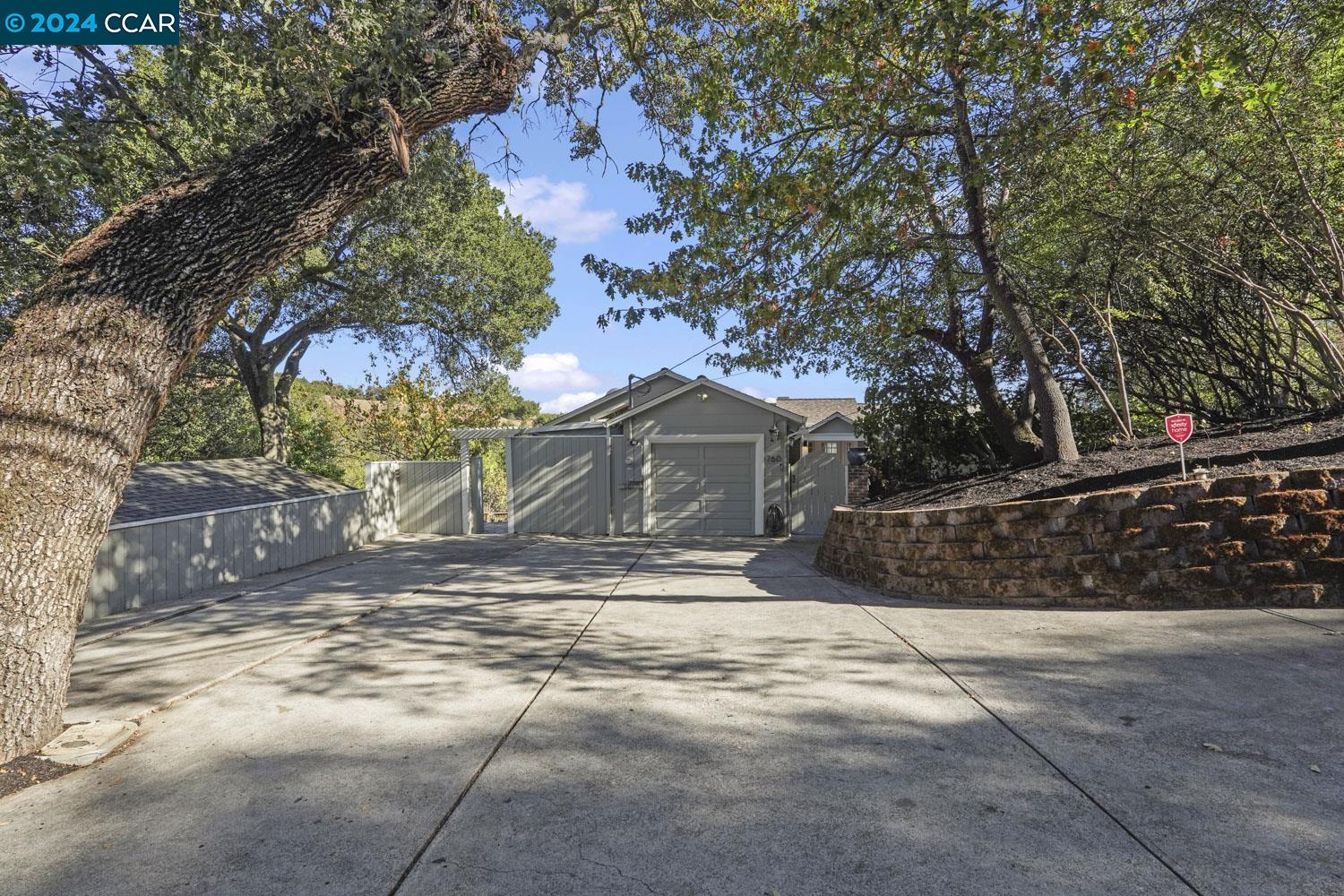 760 Moraga Road Lafayette, CA 94549 - Photo 1 of 1 a view of yard with wooden fence