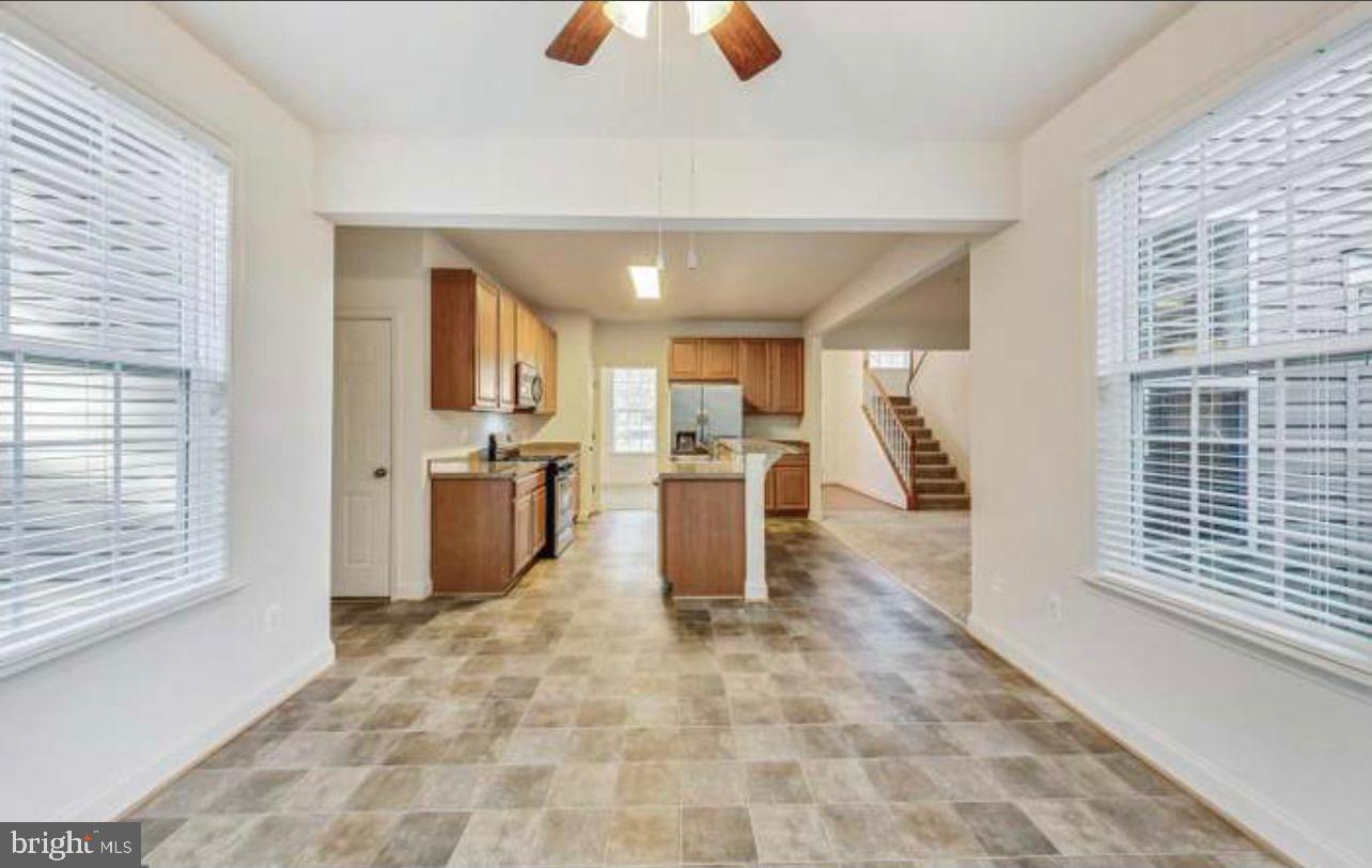 7533 Tottenham Drive White Plains, MD 20695 - Photo 18 of 51 a view of kitchen with furniture and window