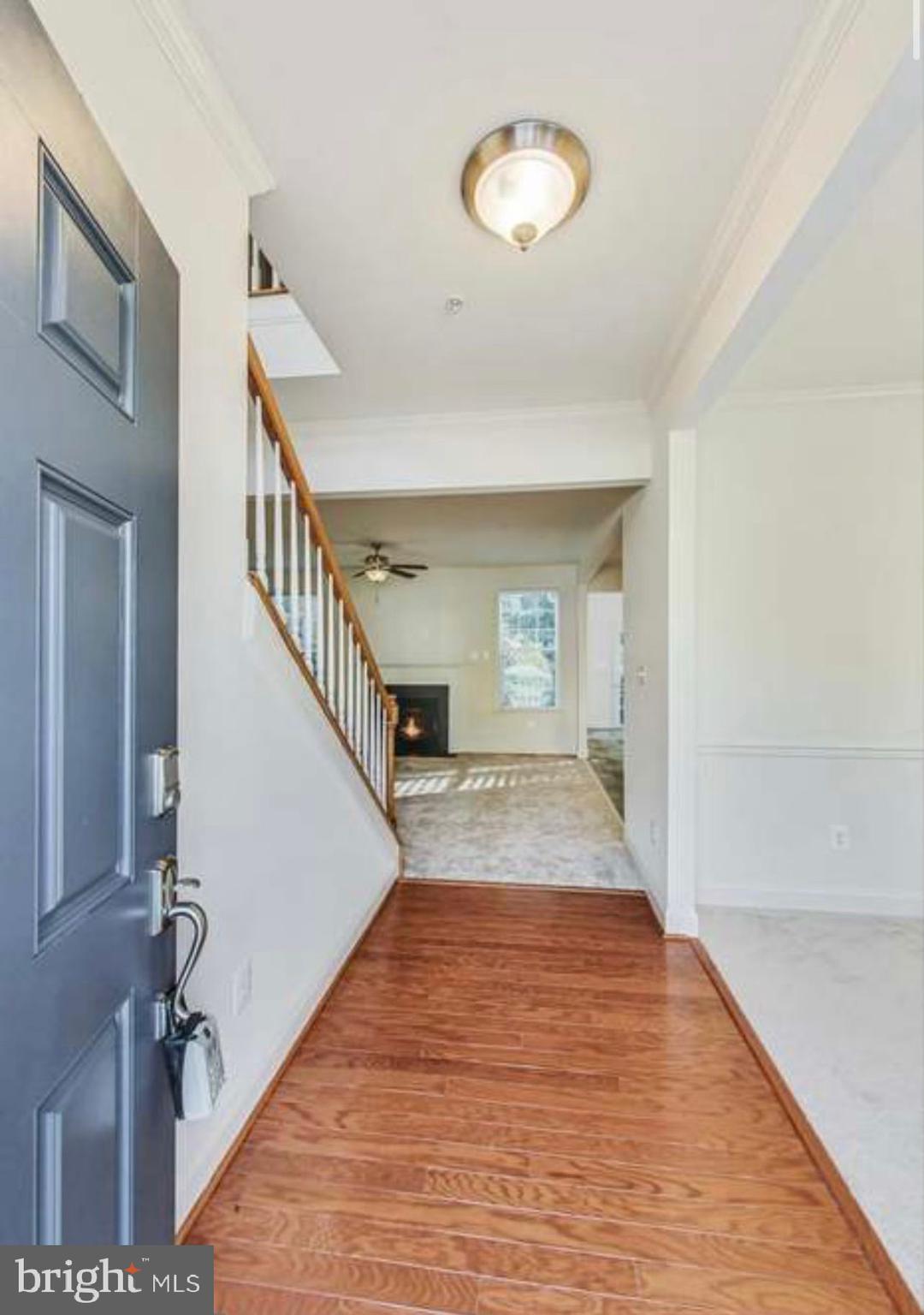 7533 Tottenham Drive White Plains, MD 20695 - Photo 2 of 51 a view of entryway and hall with wooden floor