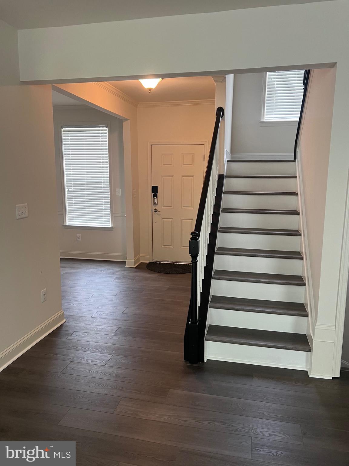 7533 Tottenham Drive White Plains, MD 20695 - Photo 46 of 51 a view of entryway with wooden floor