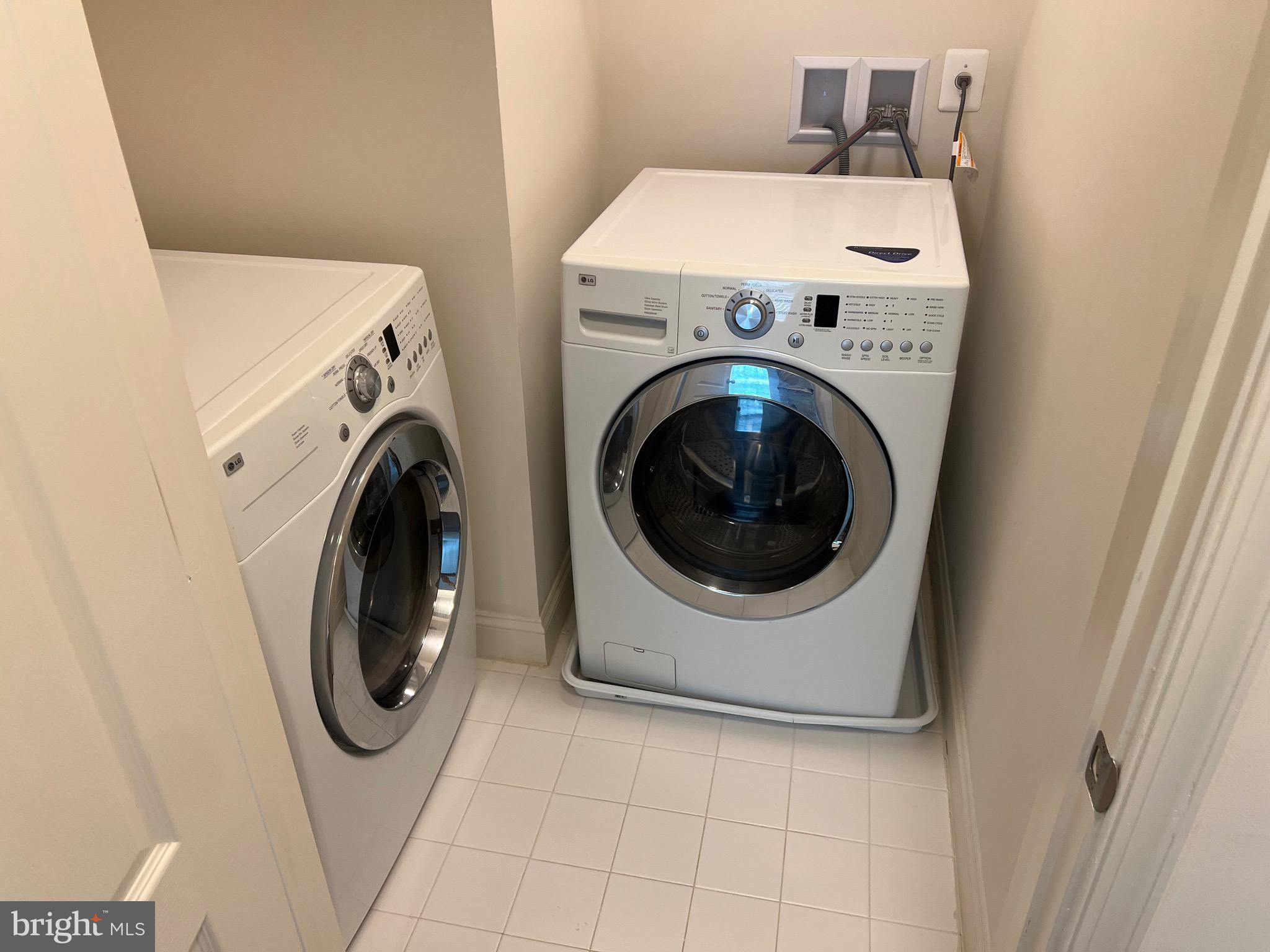 7533 Tottenham Drive White Plains, MD 20695 - Photo 49 of 51 a utility room with dryer and washer