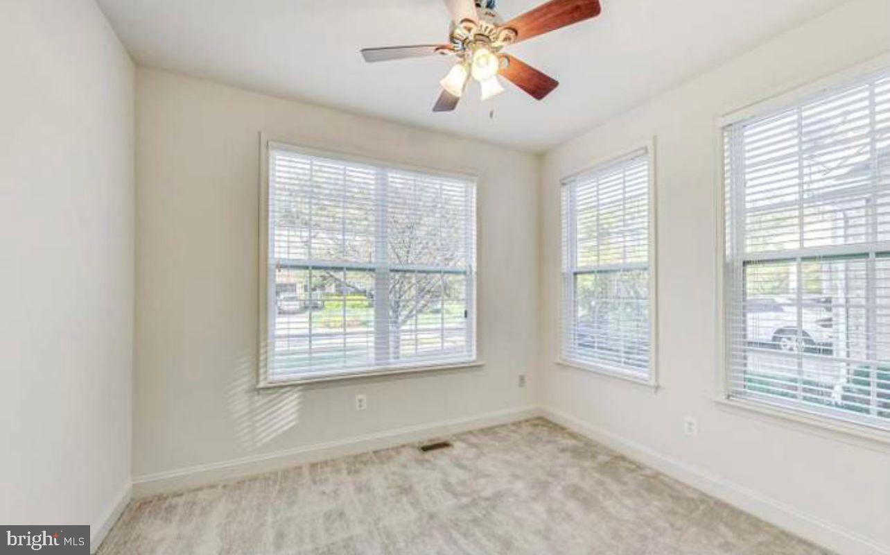 7533 Tottenham Drive White Plains, MD 20695 - Photo 7 of 51 a view of an empty room with a window