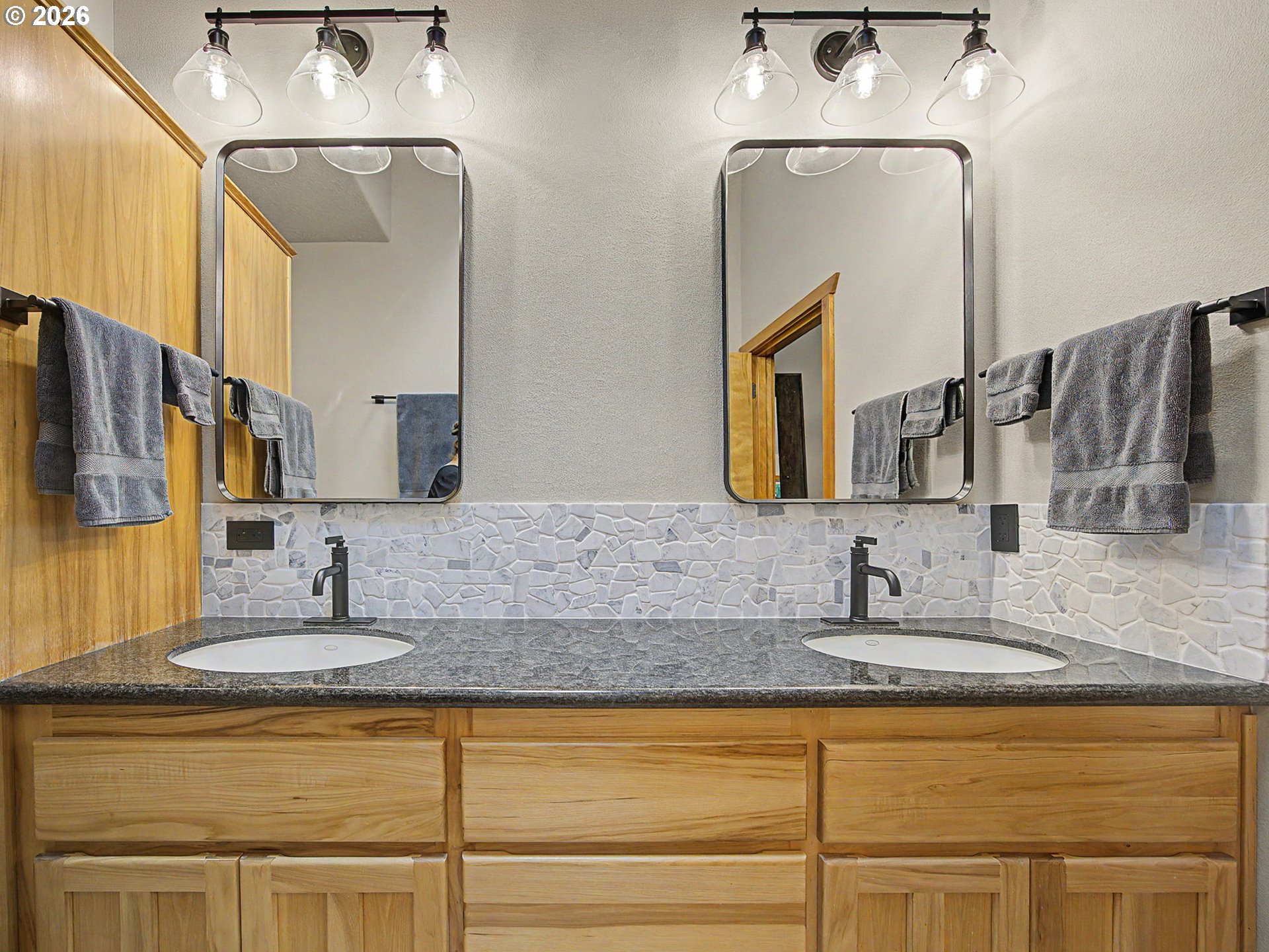 23491 East Lolo Pass Road Rhododendron, OR 97049 - Photo 25 of 47 a bathroom with double vanity sink and two mirror