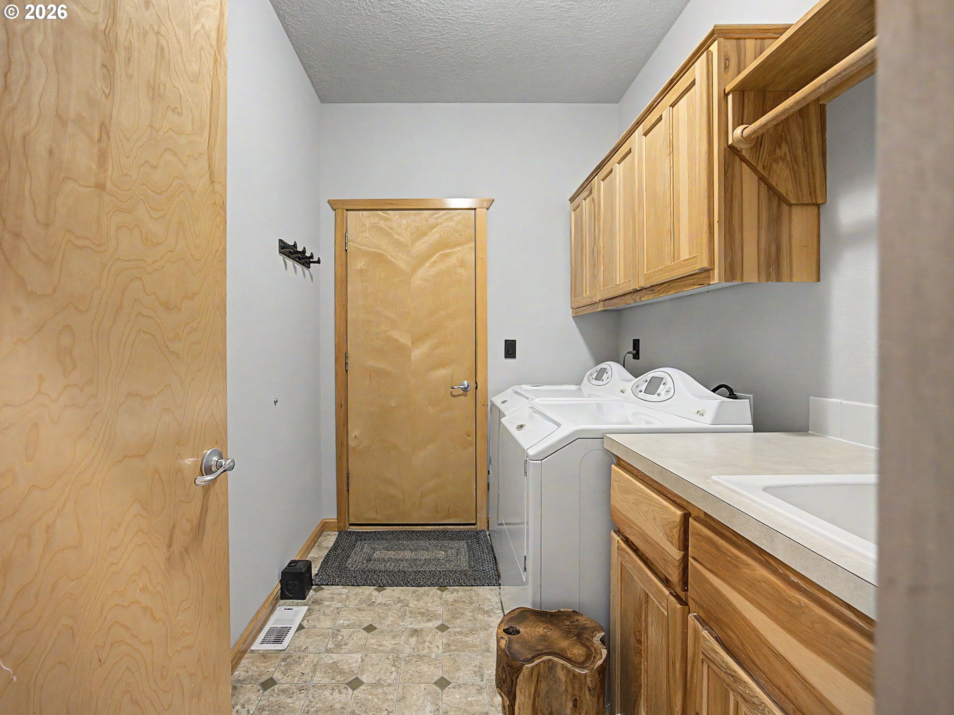 23491 East Lolo Pass Road Rhododendron, OR 97049 - Photo 33 of 47 a storage room with a washer and dryer