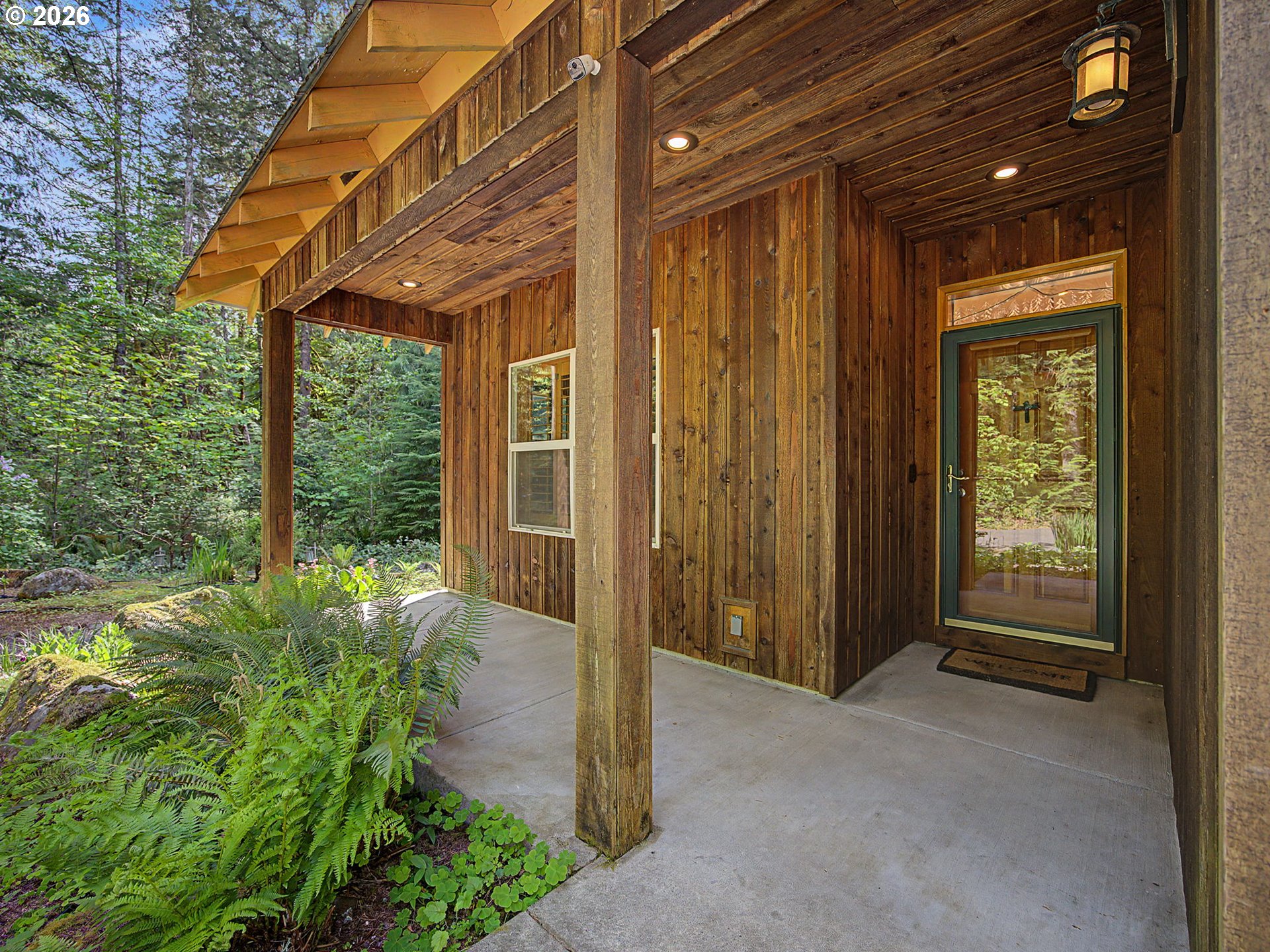 23491 East Lolo Pass Road Rhododendron, OR 97049 - Photo 5 of 47 a view of a room with a porch
