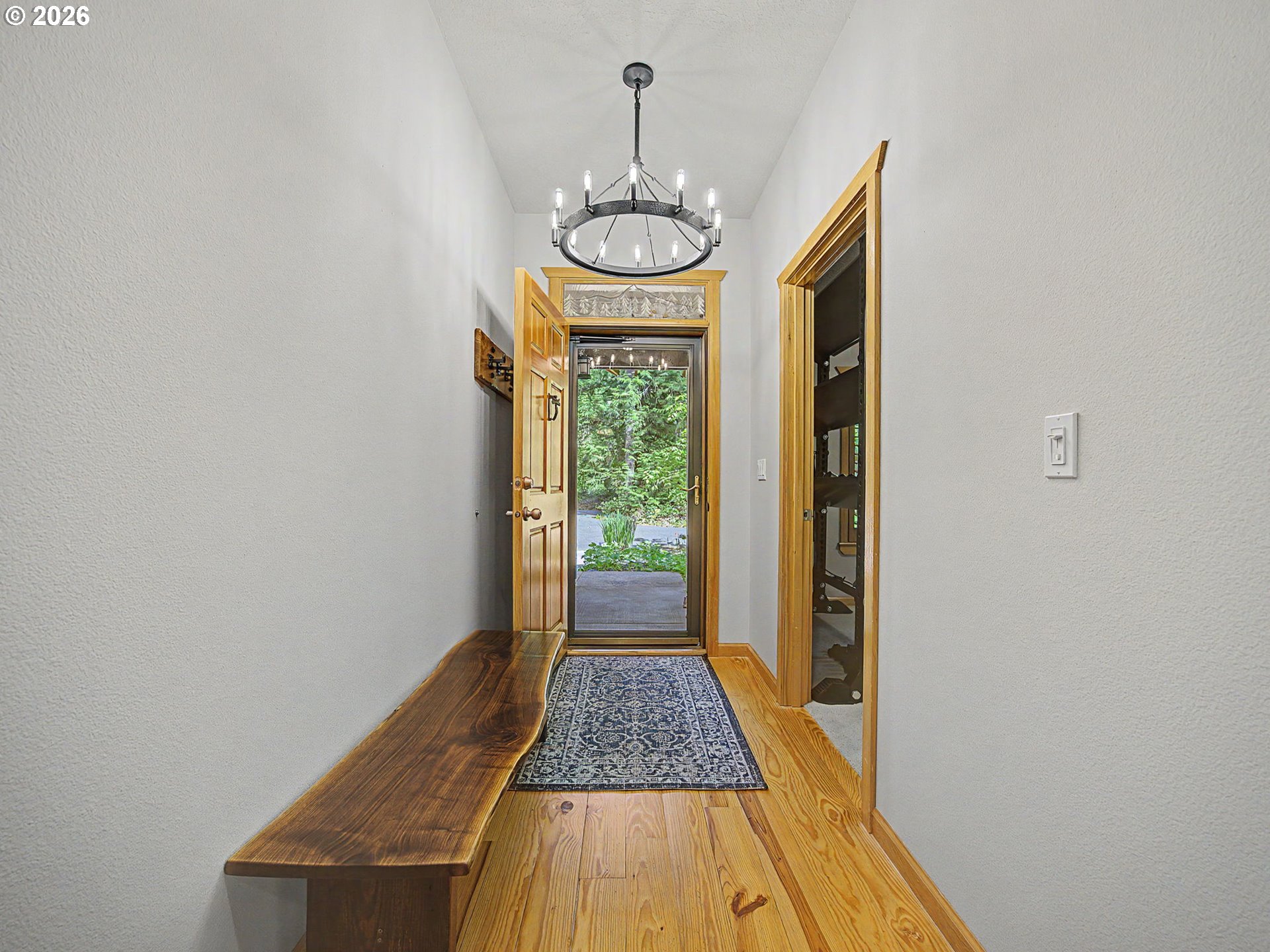 23491 East Lolo Pass Road Rhododendron, OR 97049 - Photo 8 of 47 a view of a hallway with windows