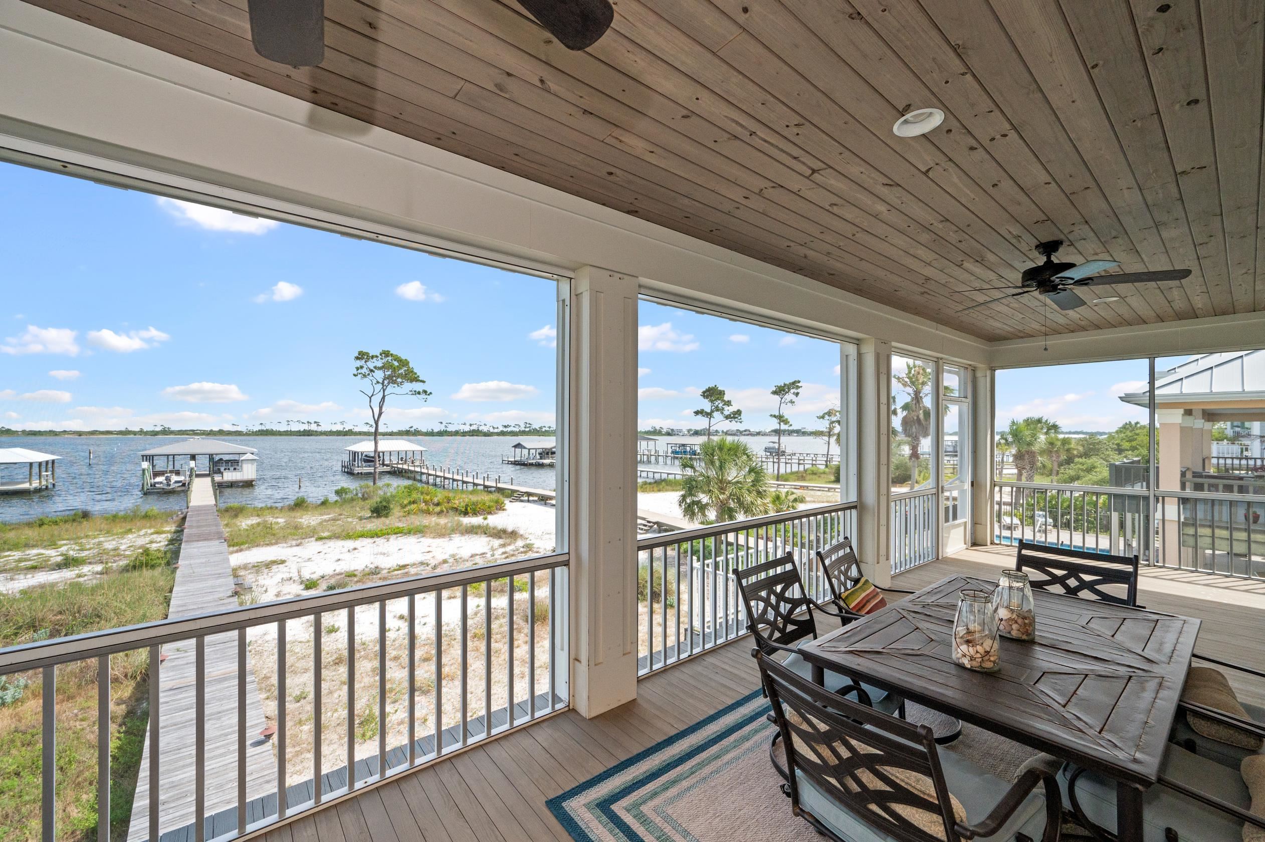 32760 River Road Orange Beach, AL 36561 - Photo 43 of 49 Outdoor dining on the screened porch