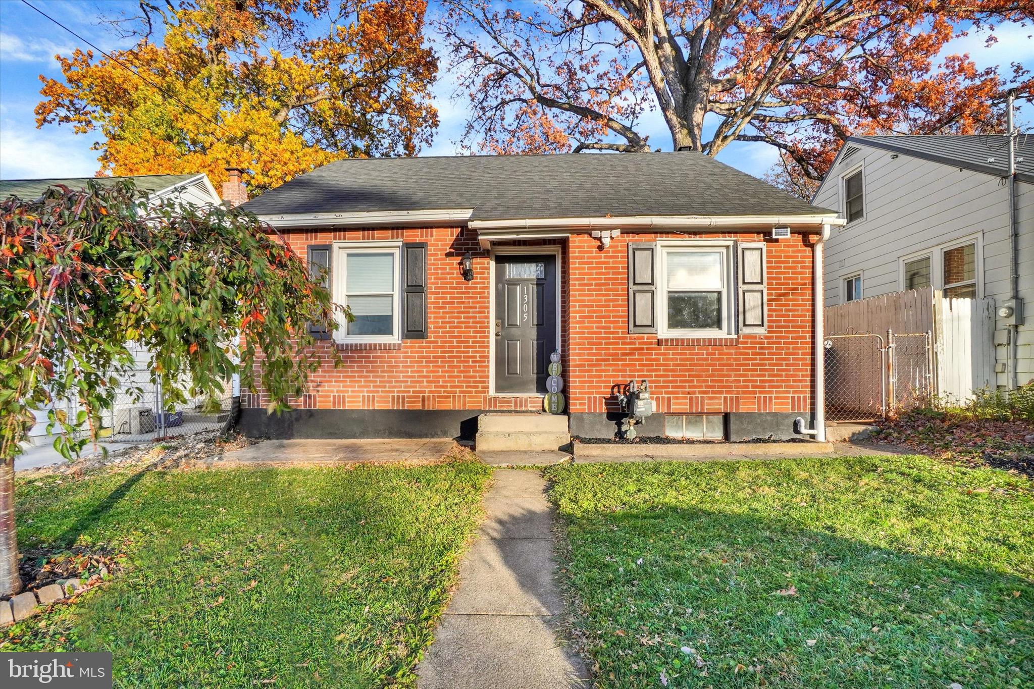 1305 Lancaster Avenue York, PA 17403 - Photo 1 of 18 a front view of a house with garden