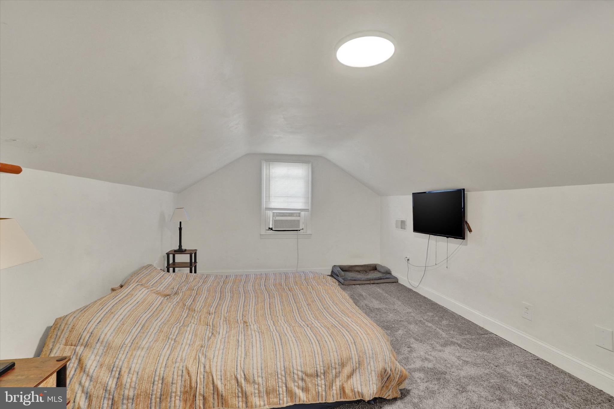 1305 Lancaster Avenue York, PA 17403 - Photo 12 of 18 a bedroom with a bed and a flat screen tv