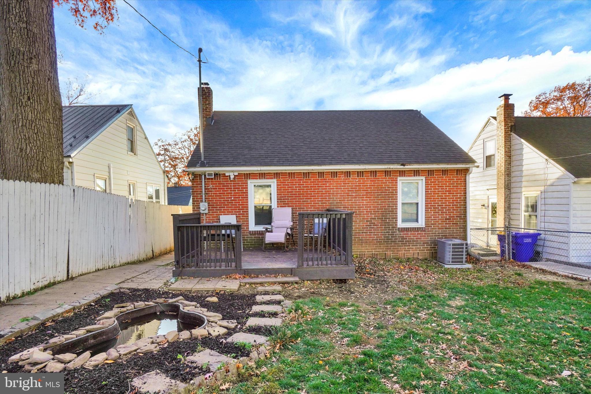 1305 Lancaster Avenue York, PA 17403 - Photo 15 of 18 a backyard of a house with yard fire pit and outdoor seating