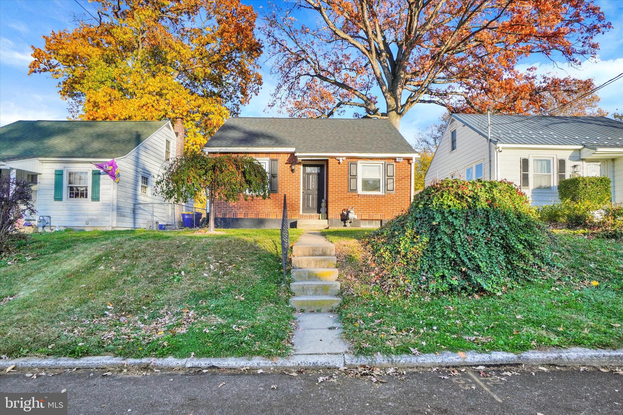 1305 Lancaster Avenue York, PA 17403 - Photo 2 of 18 front view of house with a yard
