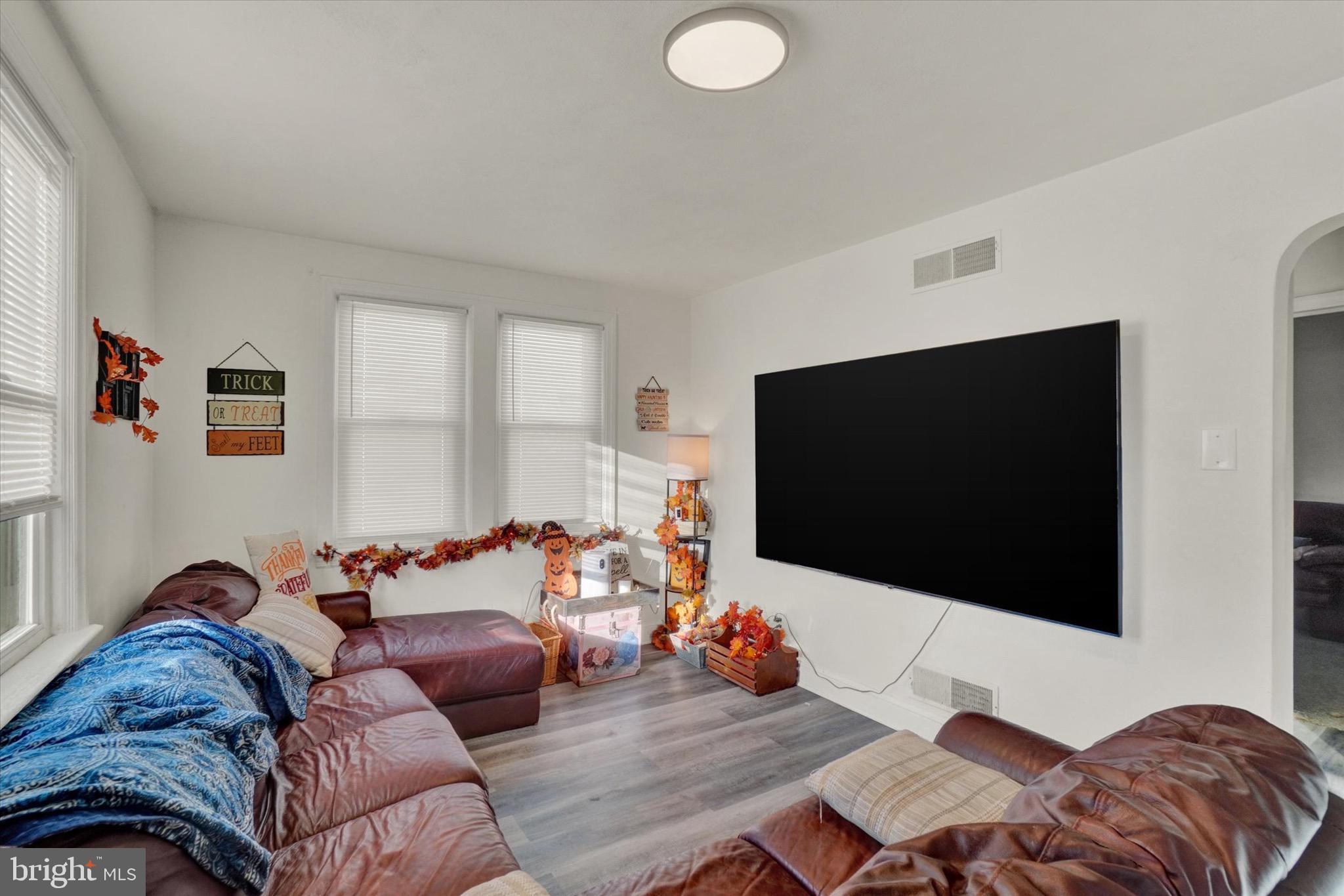 1305 Lancaster Avenue York, PA 17403 - Photo 7 of 18 a living room with furniture and a flat screen tv
