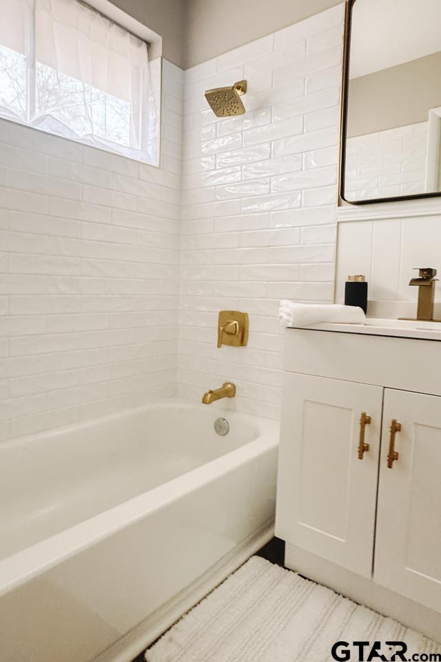 3131 Greg Lane Tyler, TX 75701 - Photo 3 of 47 a bathroom with a bathtub and shower