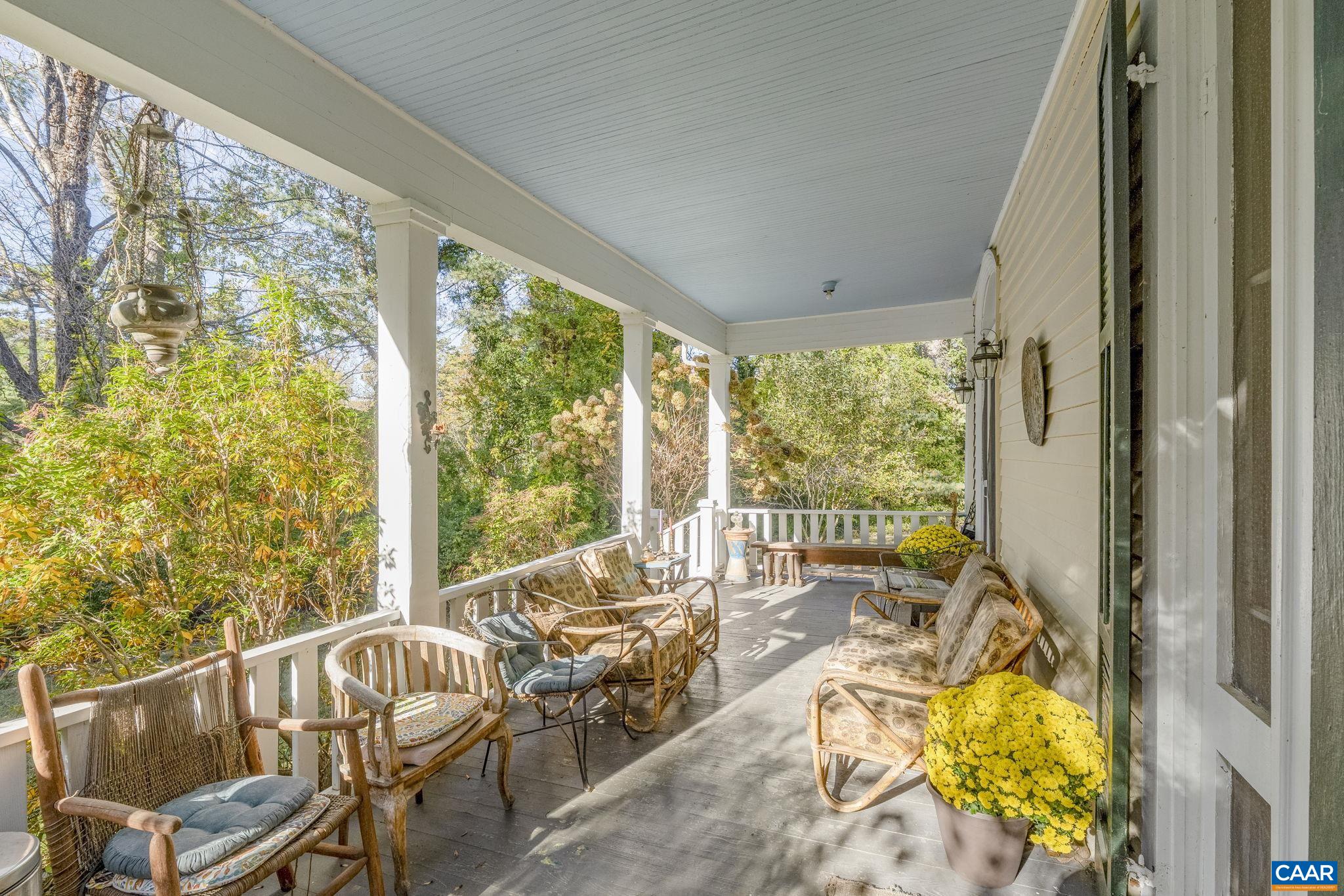 5515 Gordonsville Road Keswick, VA 22947 - Photo 11 of 74 a living room with furniture and a floor to ceiling window