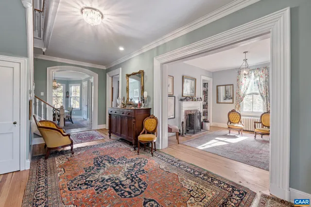 a bathroom with a sink a mirror and a shower