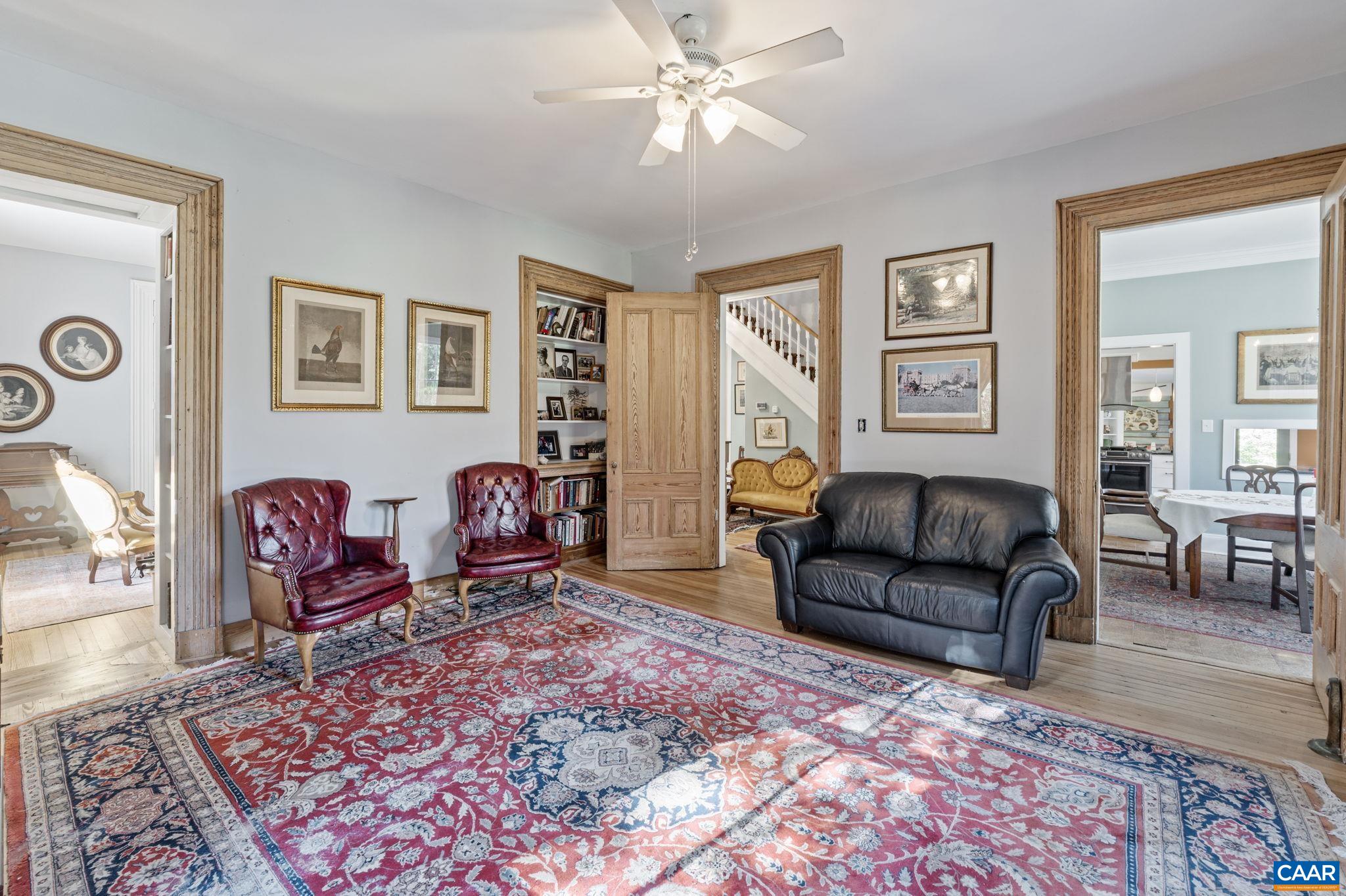 5515 Gordonsville Road Keswick, VA 22947 - Photo 18 of 74 a living room with furniture and a fireplace