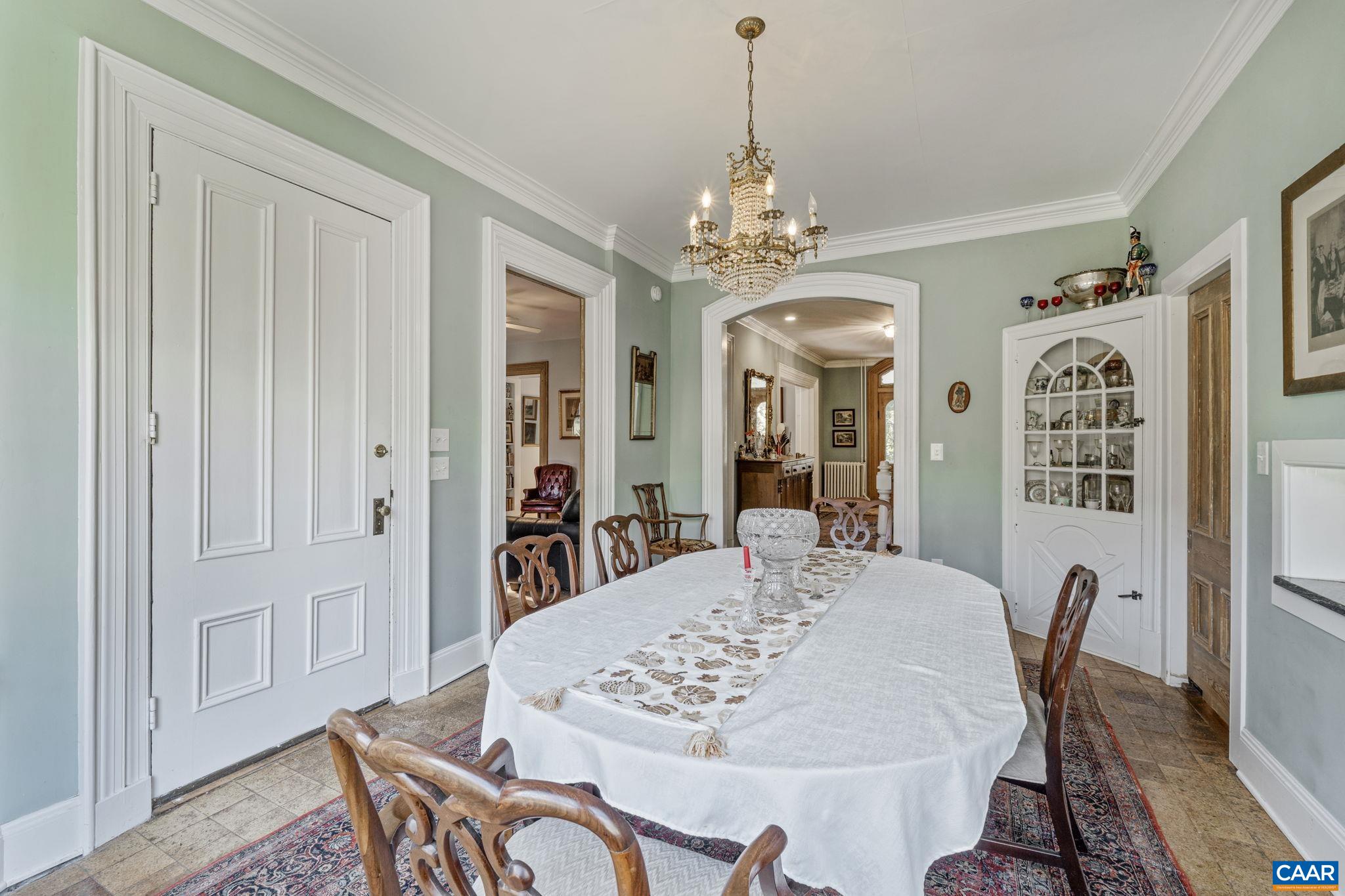 5515 Gordonsville Road Keswick, VA 22947 - Photo 21 of 74 a view of a dining room with furniture window and wooden floor