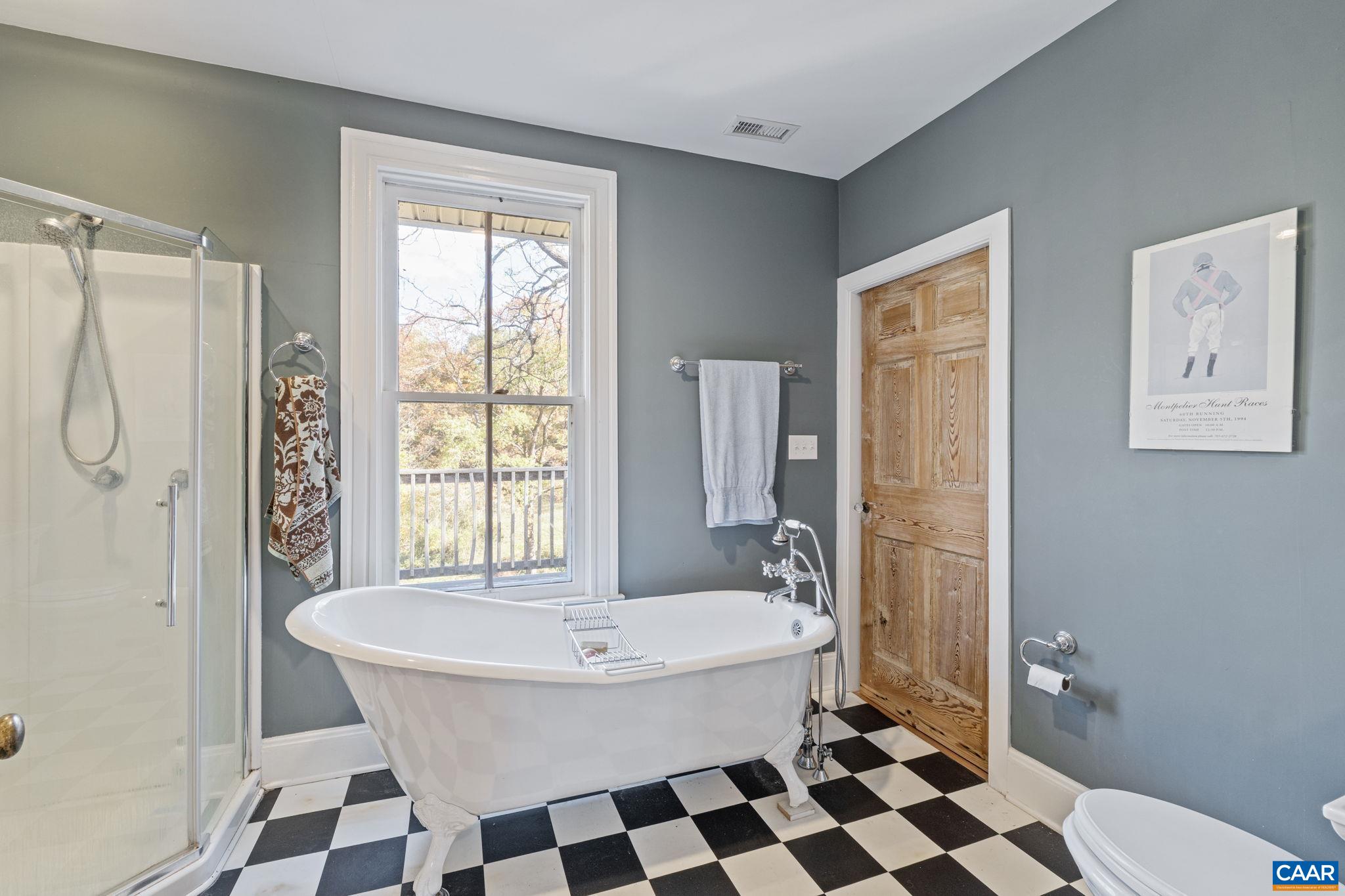 5515 Gordonsville Road Keswick, VA 22947 - Photo 38 of 74 a bathroom with a sink and a mirror