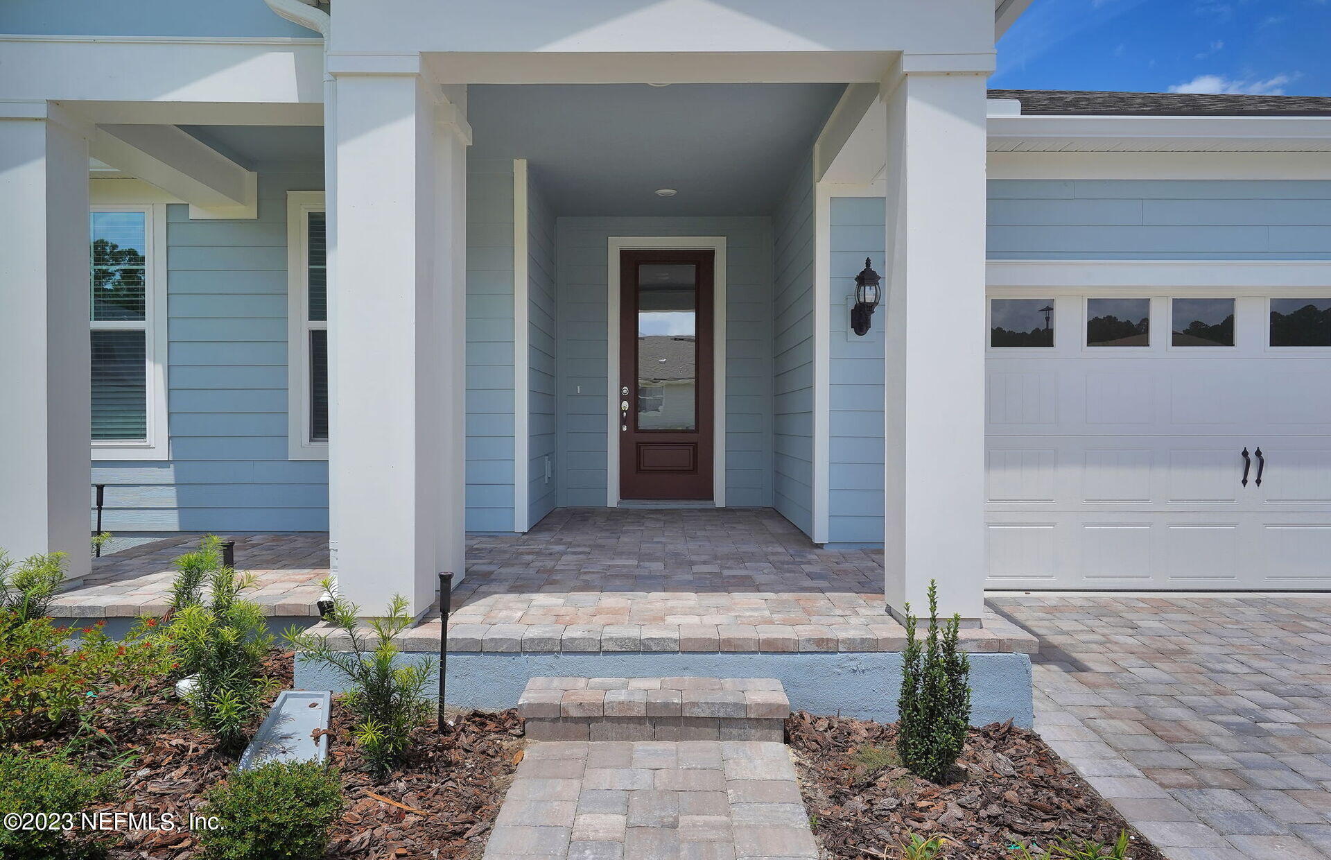 357 Muhly Grass Street Yulee, FL 32097 - Photo 2 of 20 a front view of a house